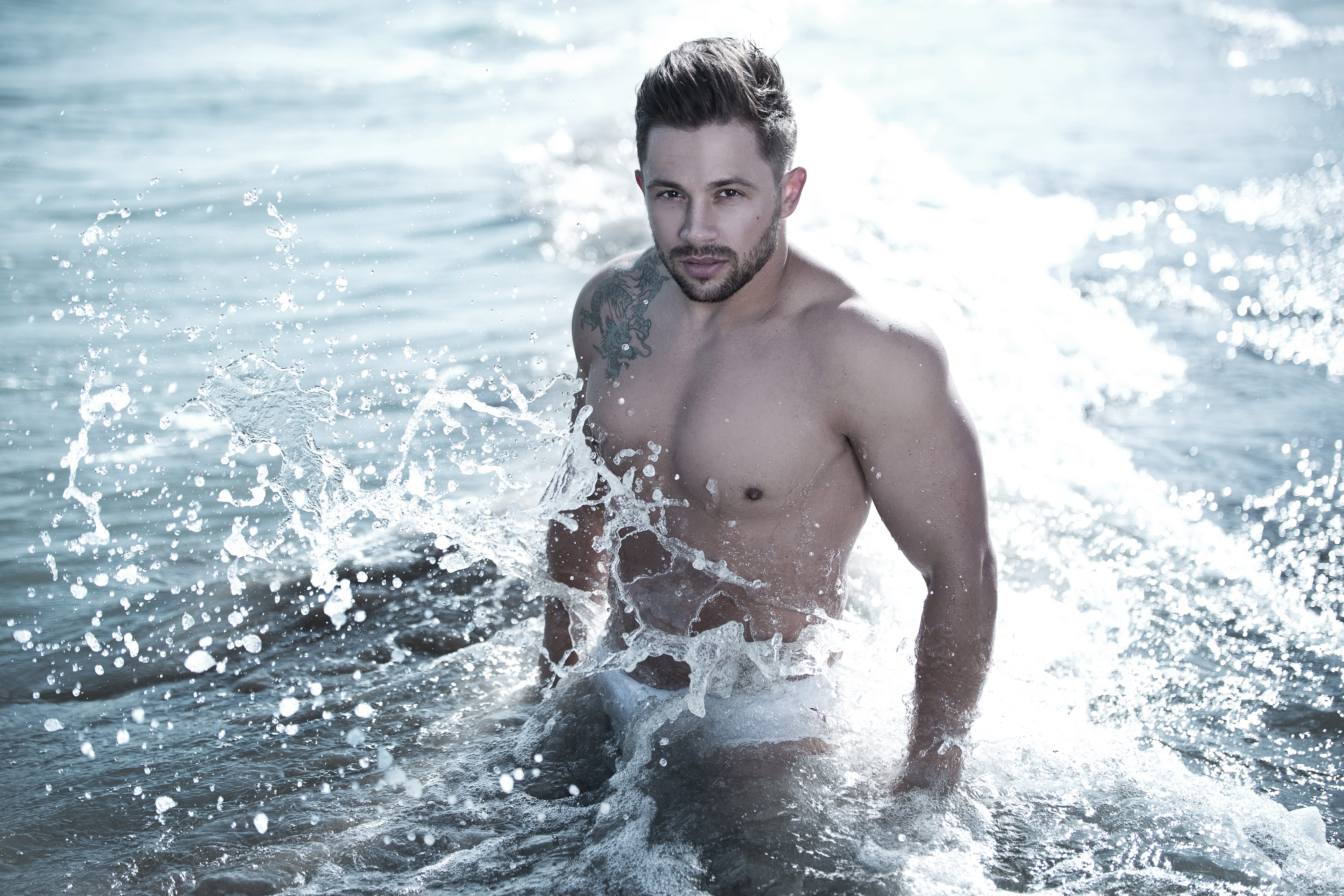 portrait, body, blur, sea, beach, leisure, man, looking at camera, wearing, lifestyles, facial hair, nature, motion, splash, close-up, 5K, splashing, h2o, HD Wallpaper