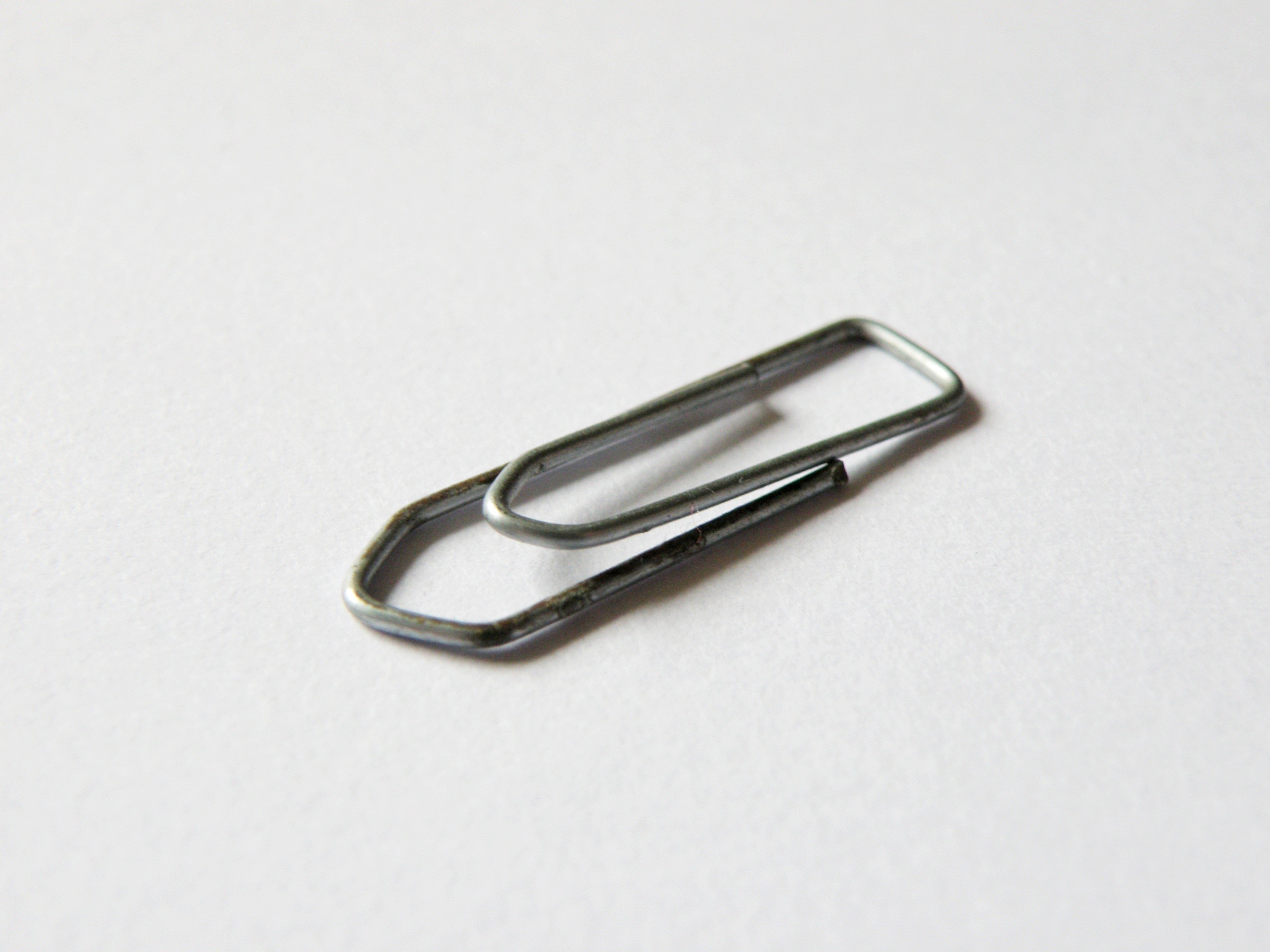 indoors, 2K, steel, close-up, exclusion, paper clip, white background, clip, organization, single object, no people, cut out, alloy, paperclip, attached, HD Wallpaper