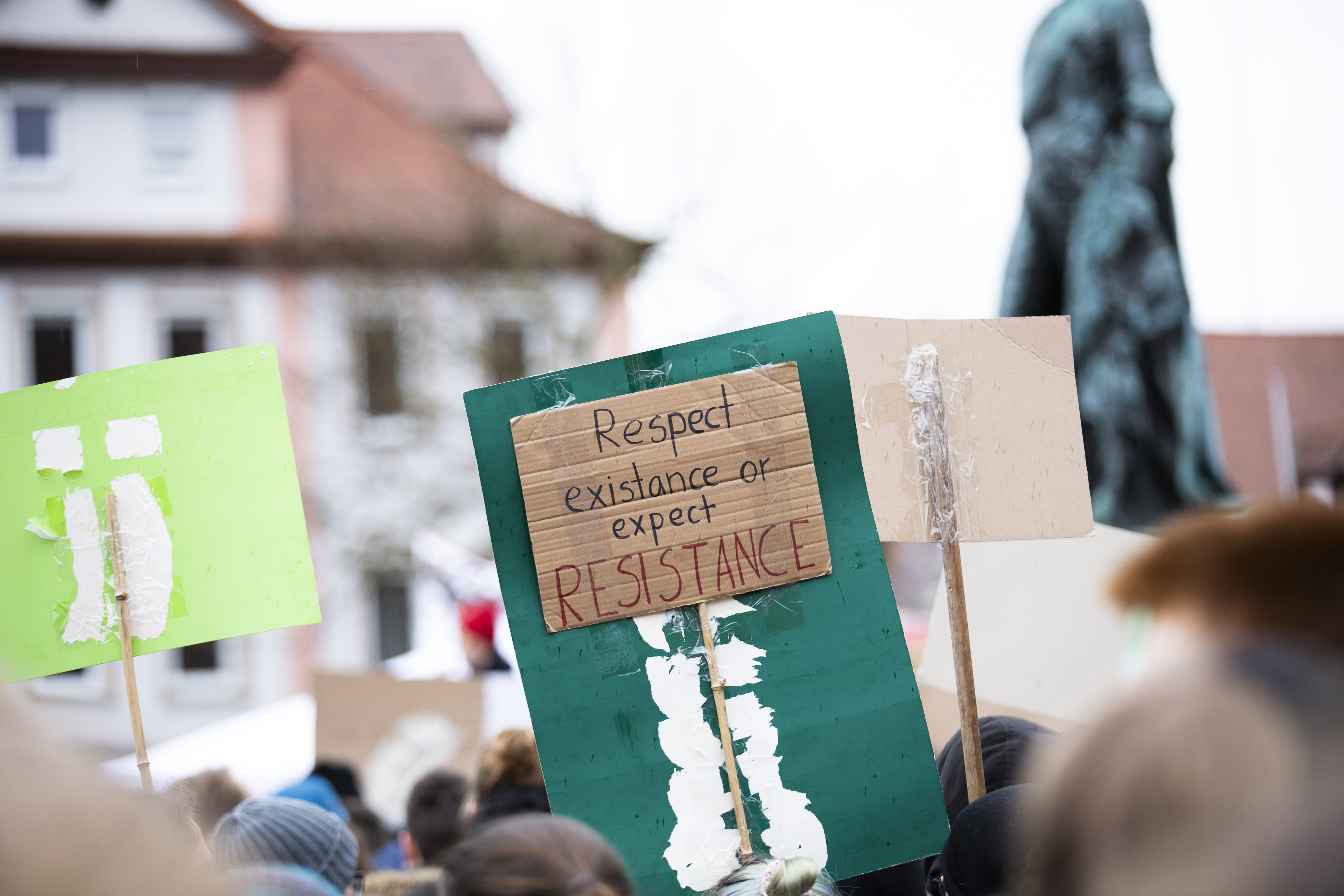printer, daylight, women, paper, global, message, text, day, people, crowd, protest, existance, placard, information, building, 5K, focus on foreground, HD Wallpaper