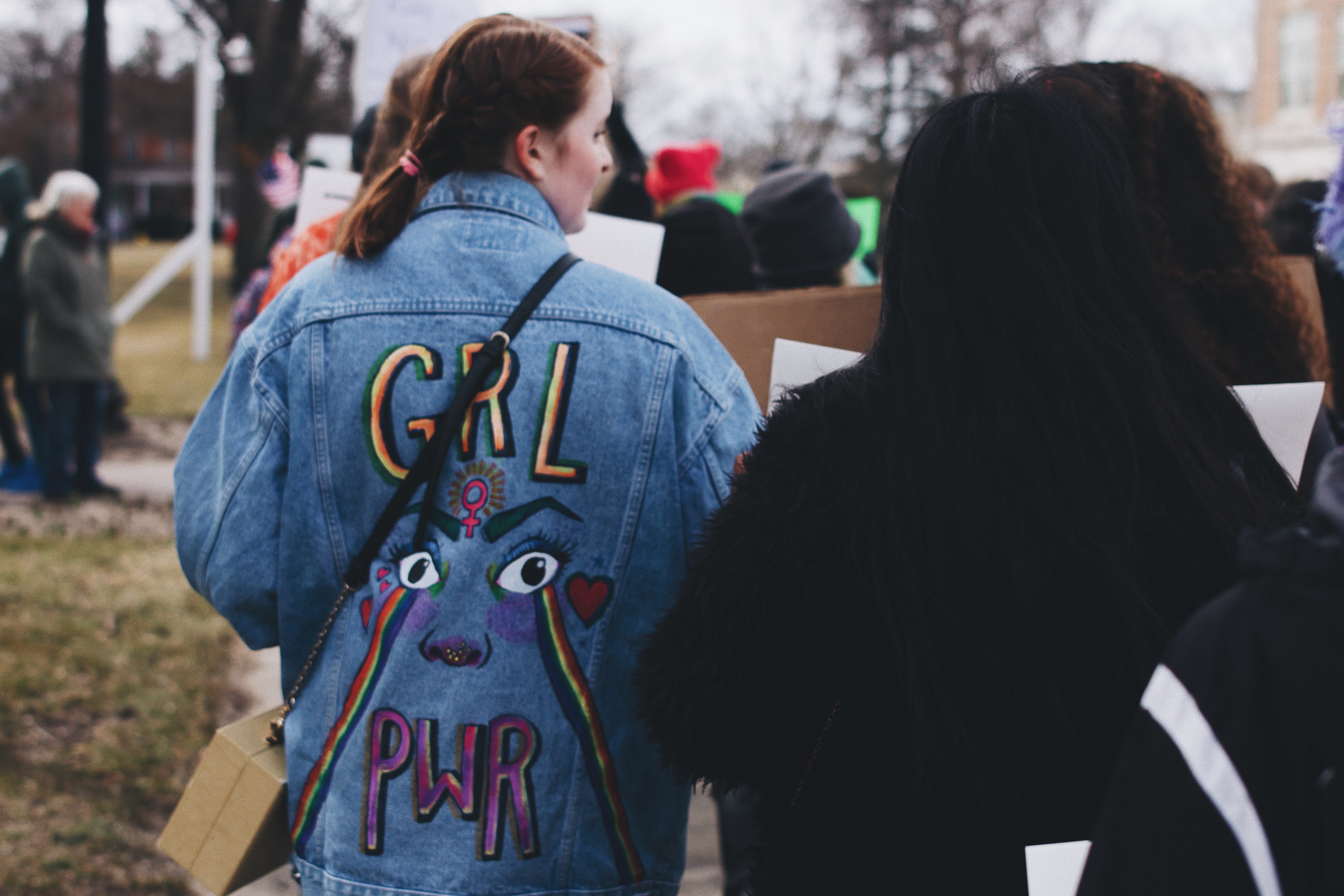 denim jacket, child, daytime, activism, incidental people, teenager, painting, warm clothing, pavement, clothing, adult, day, standing, hairstyle, communication, HD Wallpaper
