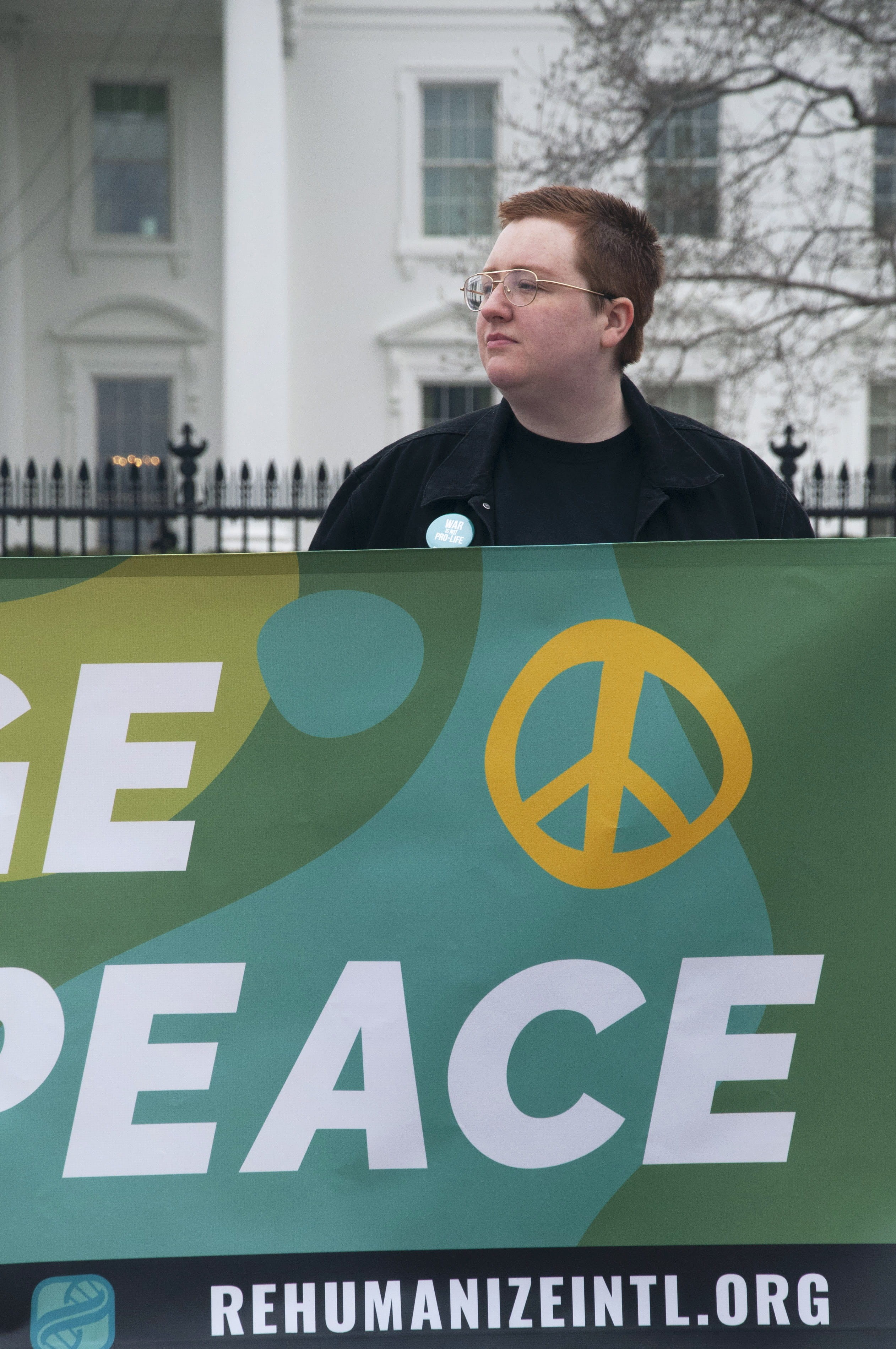 banner, dc, peace, day, poster, right, text, rehumanize, standing, front view, word, protest, united states, fence, real people, green color, teal, one person, Phone HD Wallpaper