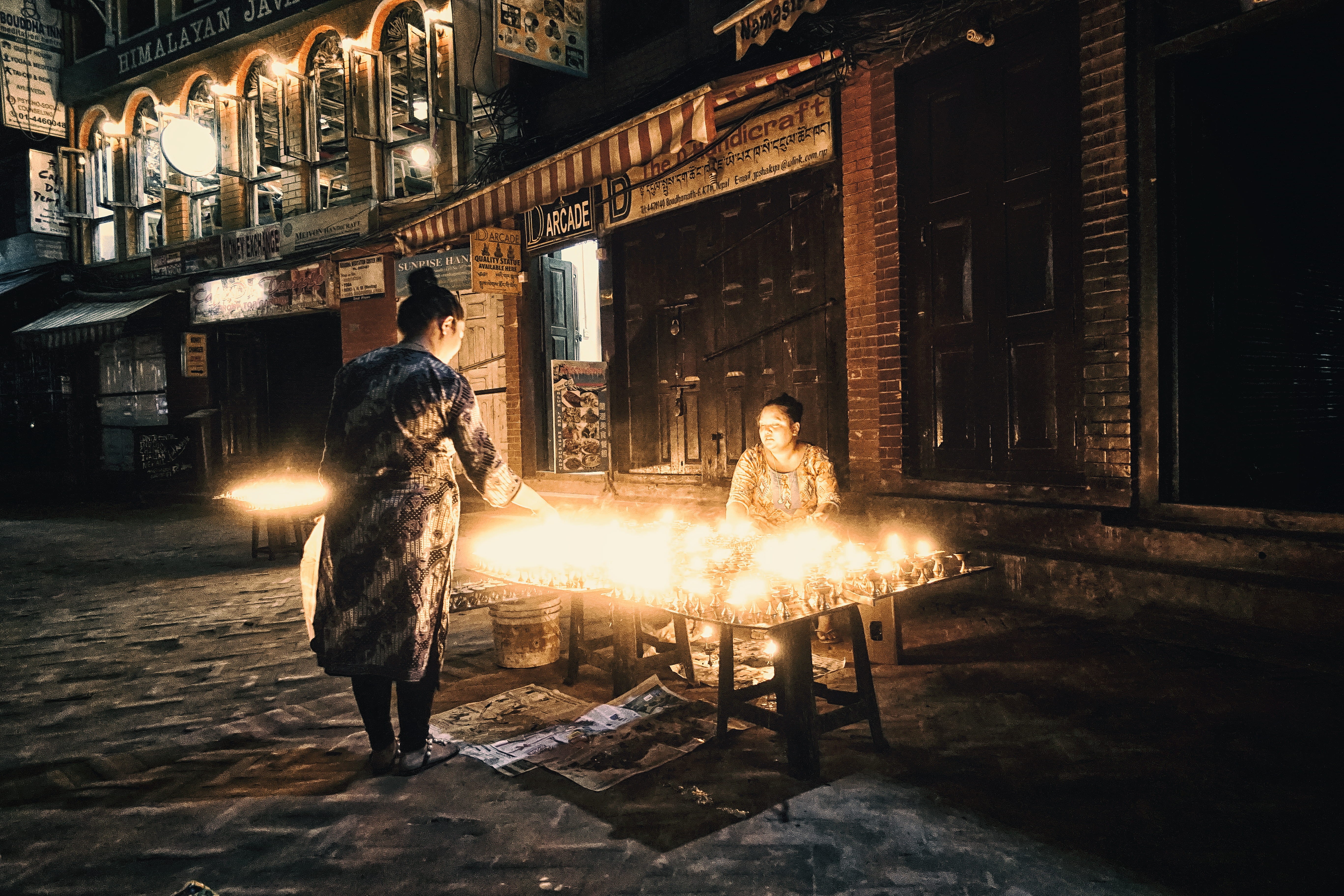 tourism, burning, buddhism, architecture, trader, faith, fire, building exterior, women, himalayas, buddha, standing, blurred motion, nepal, built structure, HD Wallpaper