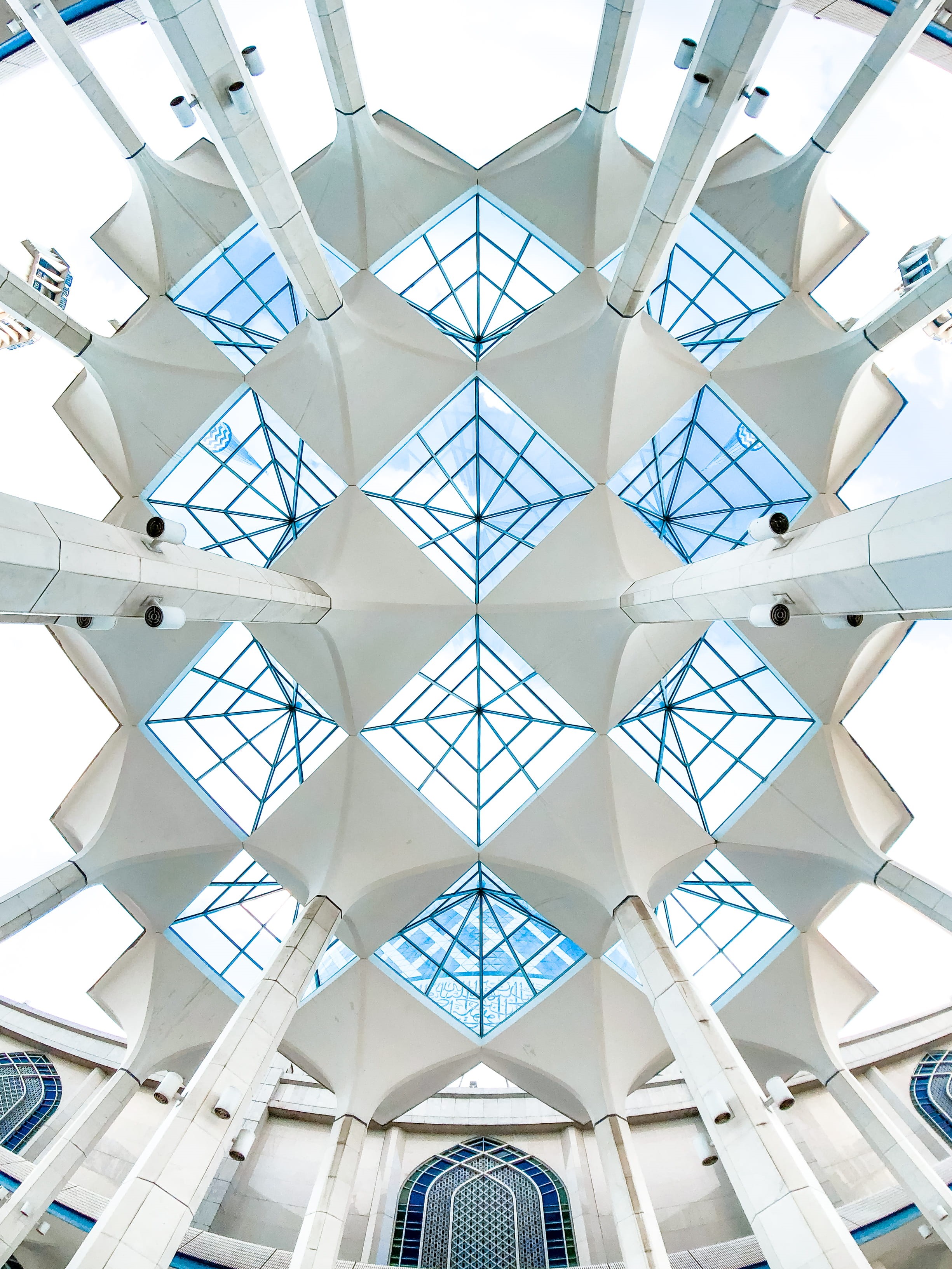 2K, white color, white, mosque, minimal, malaysia, pillars, low angle view, geometry, built structure, day, looking up, blue, architectural feature, architecture and art, Phone HD Wallpaper