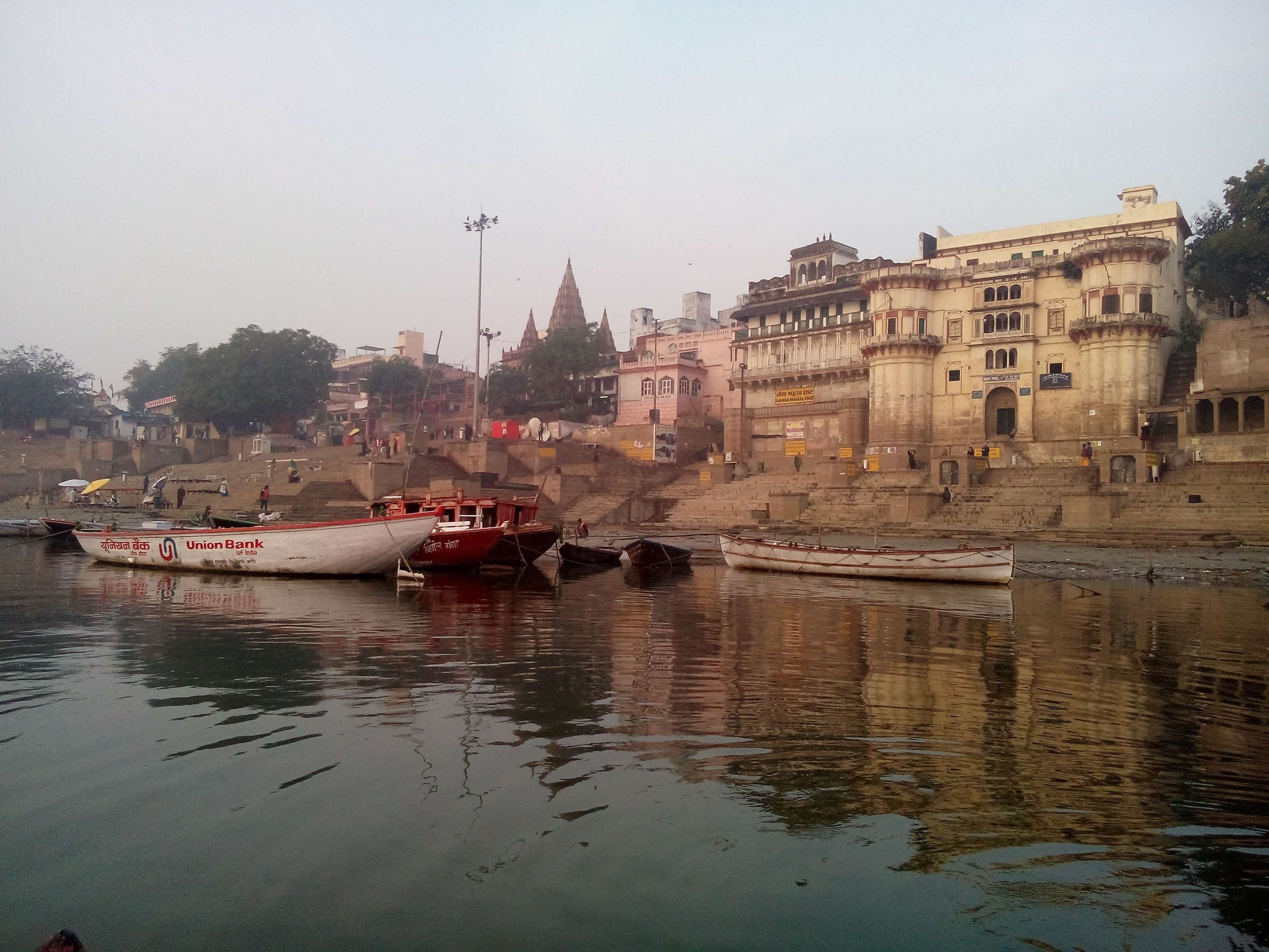 waterfront, nautical vessel, building, clear sky, nature, city, ghats, varanasi, architecture, water, day, outdoors, river, travel, 2K, sky, transportation, HD Wallpaper