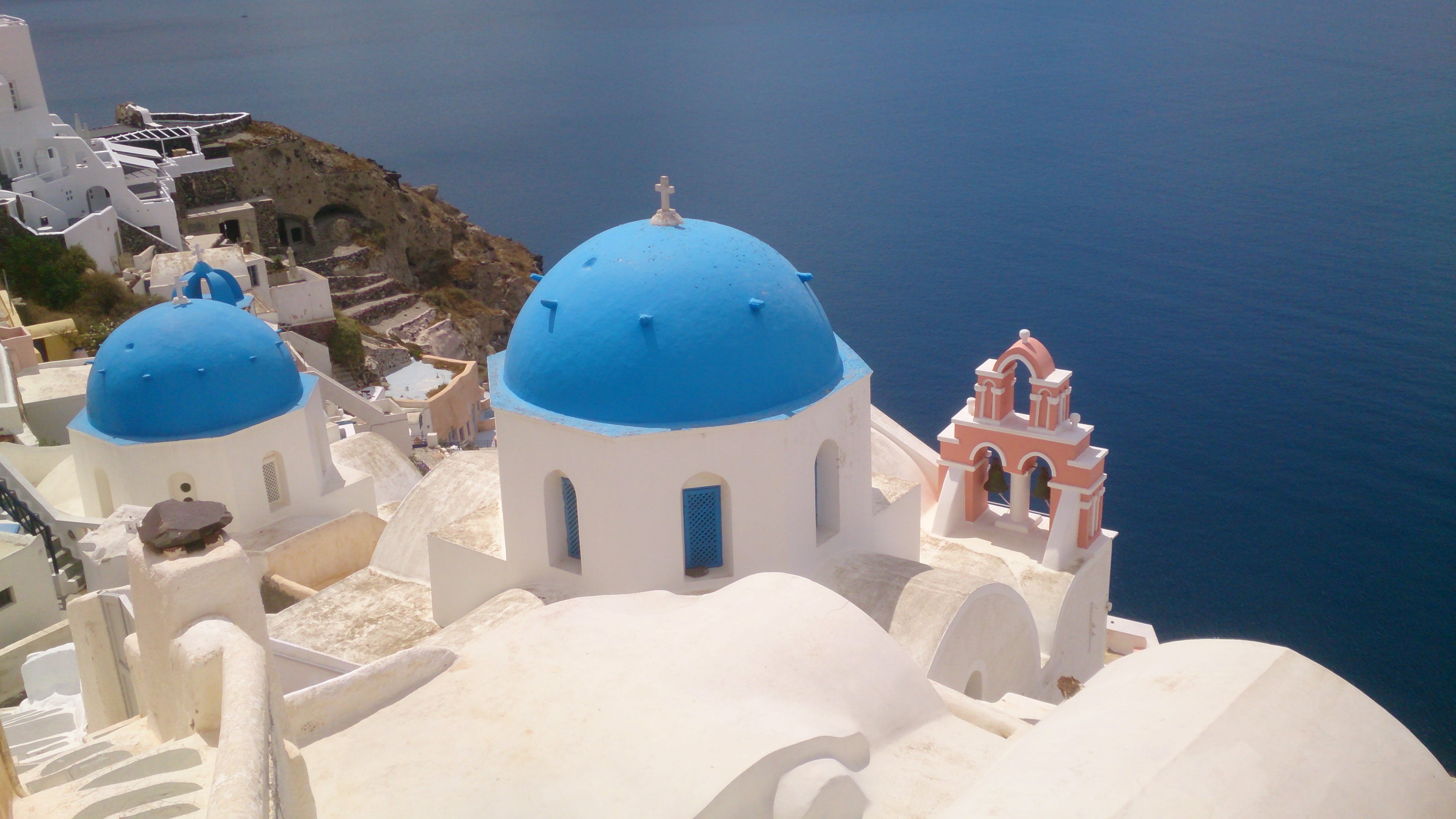 idyllic, greece, belief, greek Islands, dome, cross, island, high angle view, architecture, nature, orthodox Church, aegean Sea, sunlight, oia, water, religion, HD Wallpaper