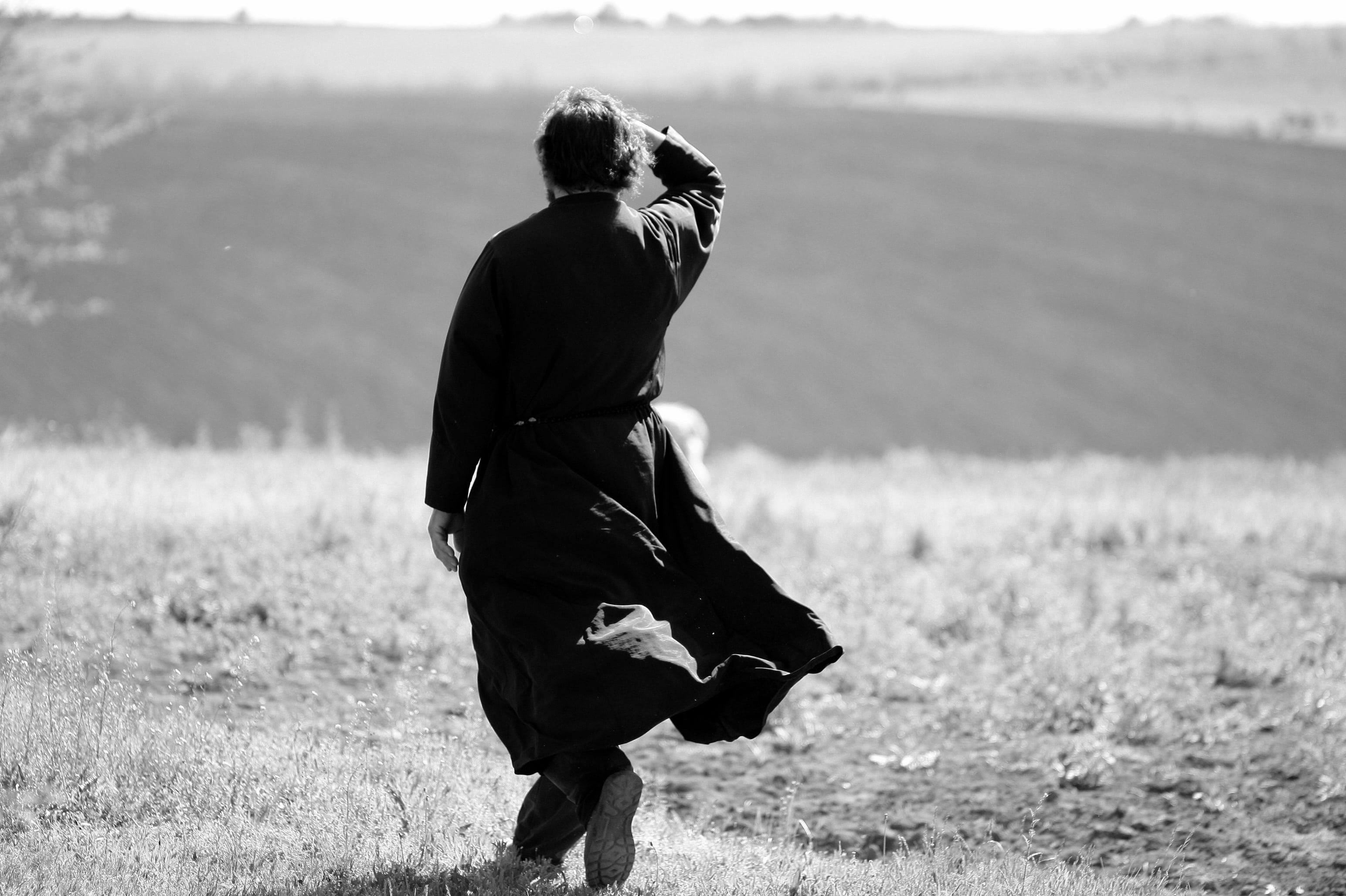 walking, forehead, rear view, plain, land, nature, photographed, one person, man, plant, people, real people, black, grass, day, holding, men, field, 2K, HD Wallpaper