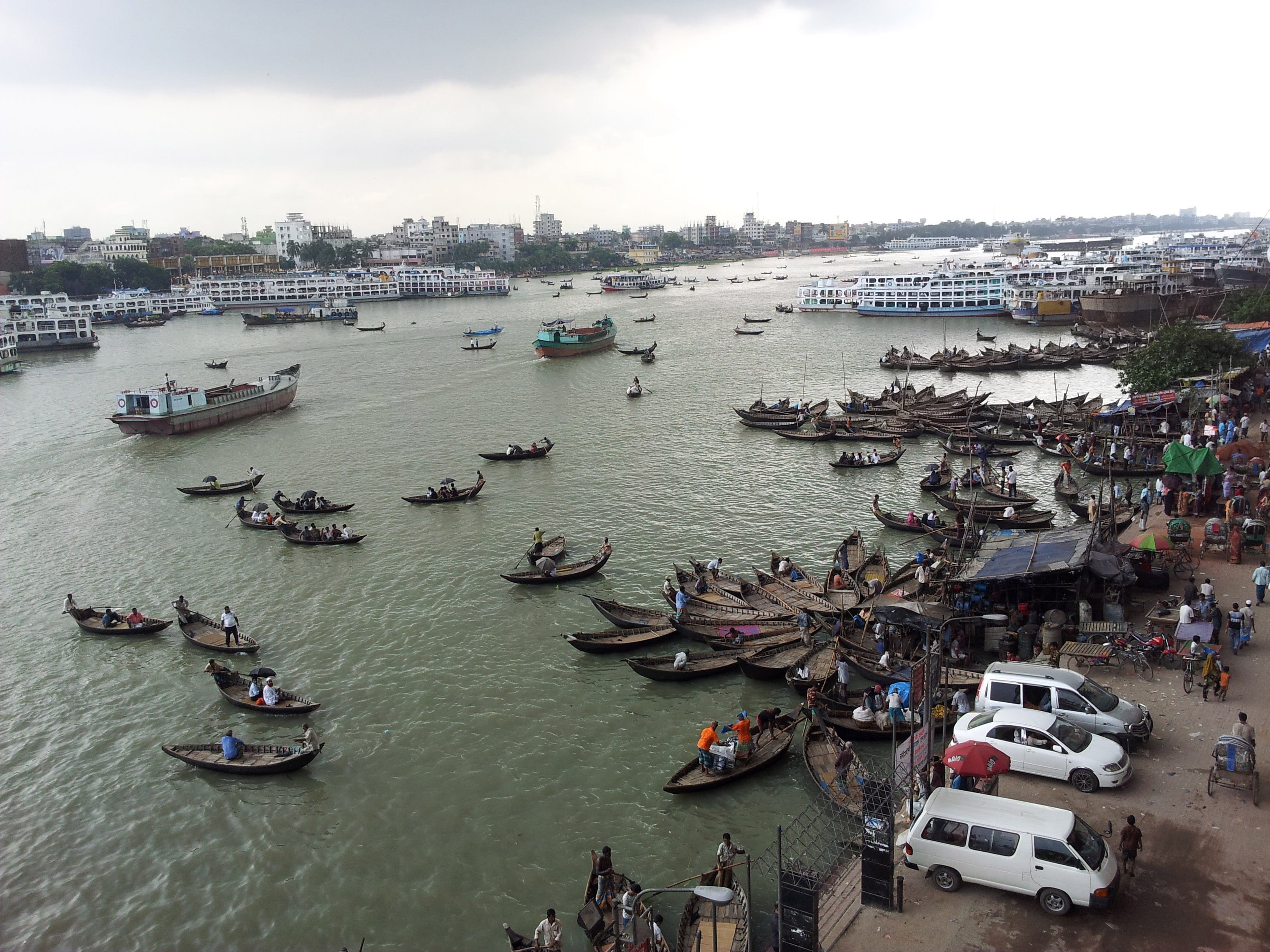Dhaka, sea, ships, 2K, Boats, buriganga, river, building exterior, travel, waterfront, moored, beach, sky, nautical Vessel, mode of transportation, photos, HD Wallpaper