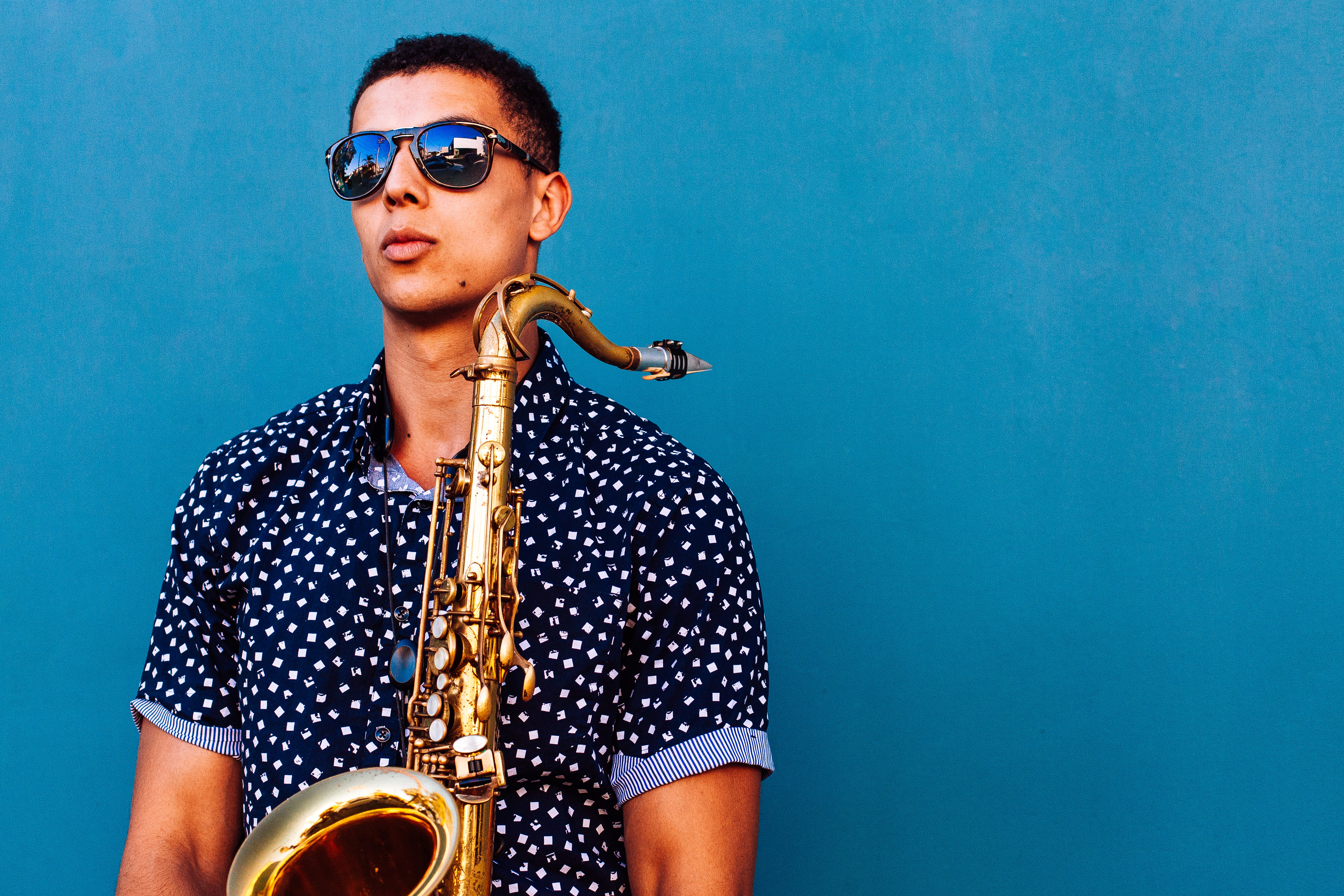 colored background, trumpet, style, music, portrait, green, wind instrument, man, one person, blue background, musical instrument, copy space, 5K, musician, HD Wallpaper