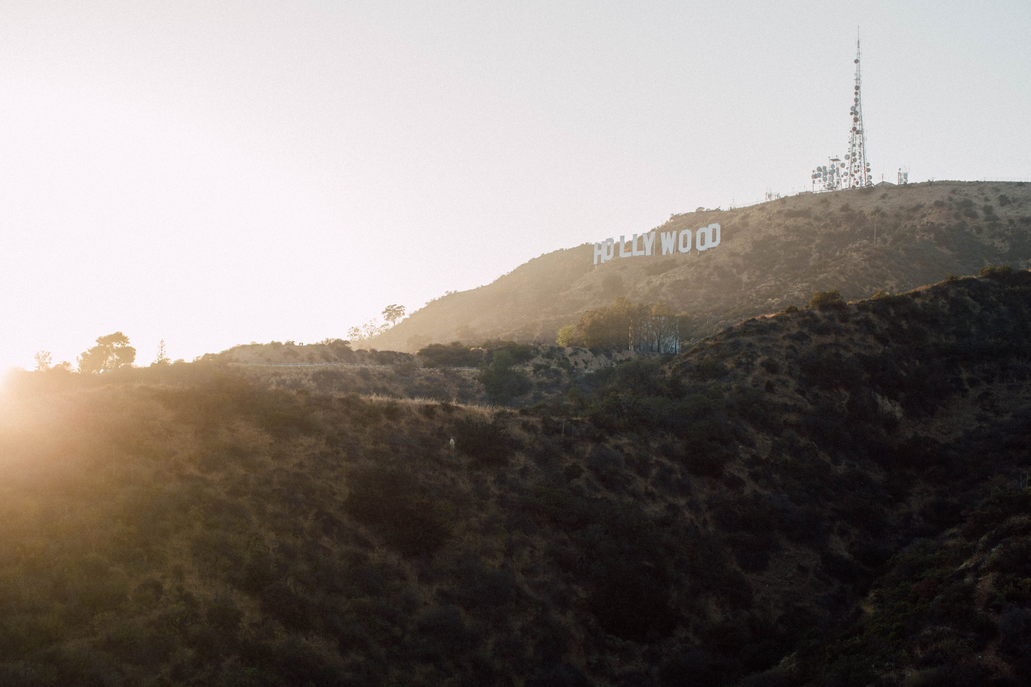 cliff, tower, daylight, land, architecture, nature, mountain, building, los angeles, no people, travel destinations, sunrise, mountain range, sunset, 2K, HD Wallpaper