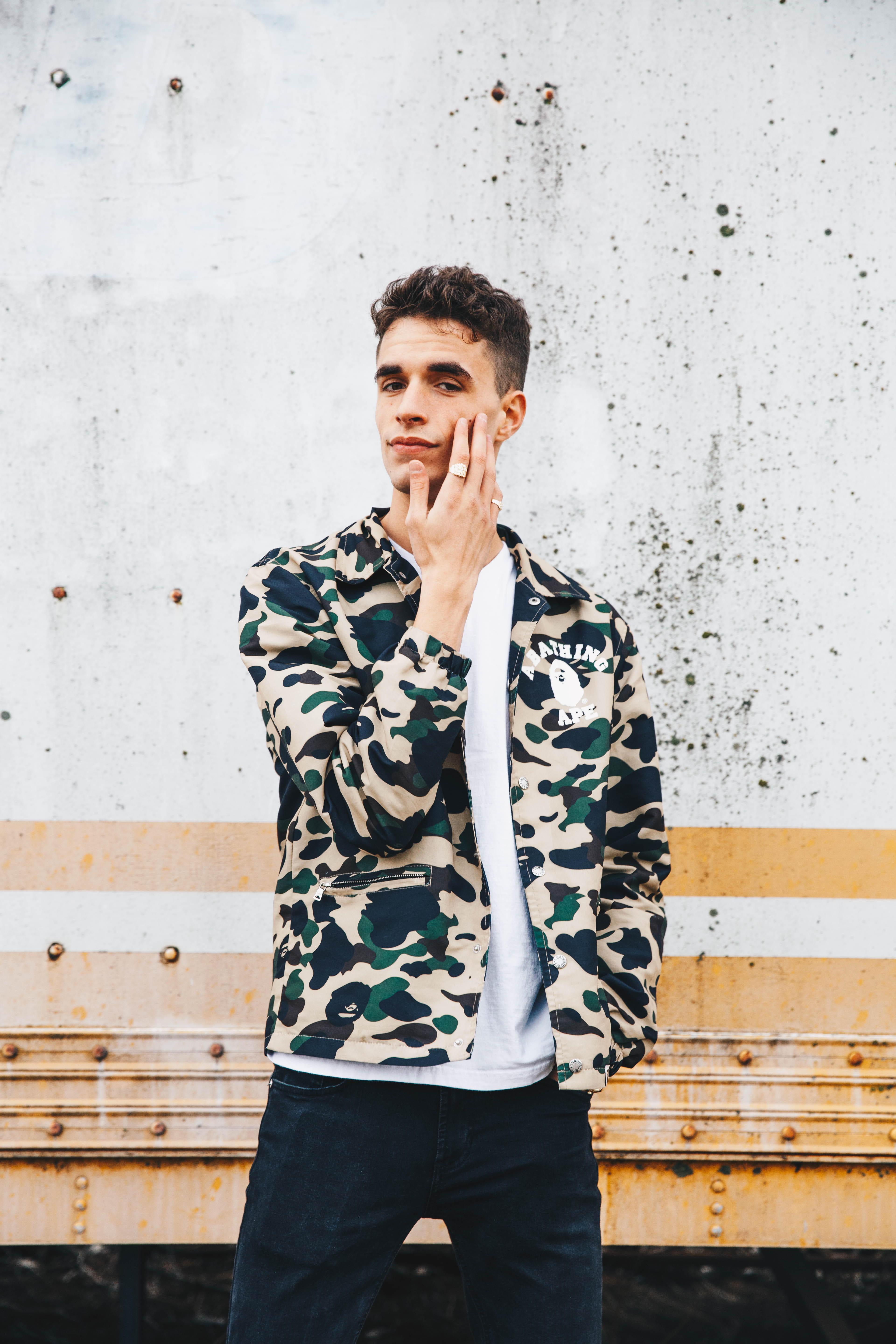 front view, lifestyles, bathing, real people, leisure activity, outdoors, jacket, day, young adult, three quarter length, wearing, communication, young men, Phone HD Wallpaper