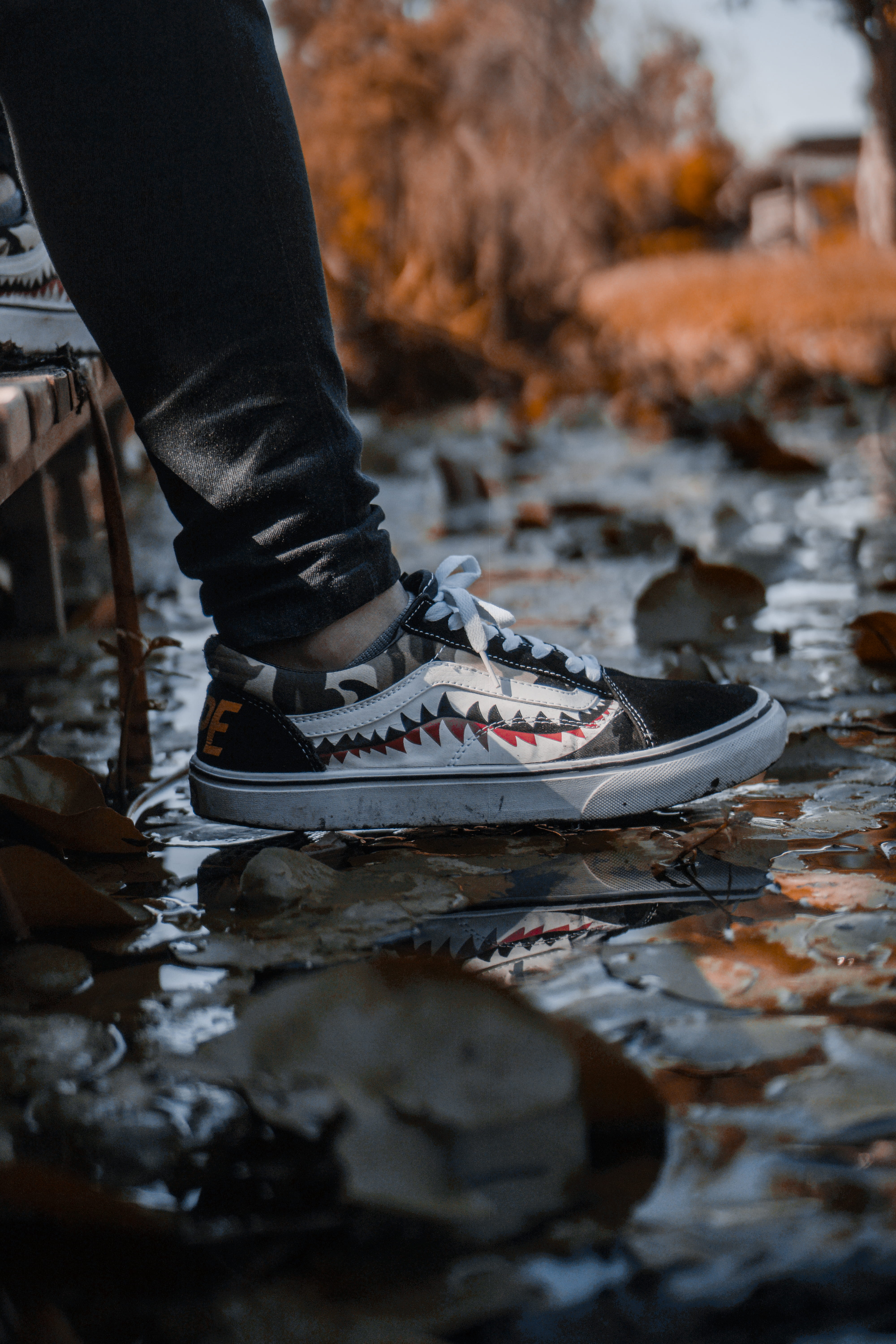 human, puddle, low section, running shoe, human leg, wheel, bape, real people, shoes, wearing, black, white, jeans, vintage, winter, ankle, pants, 5K, Phone HD Wallpaper