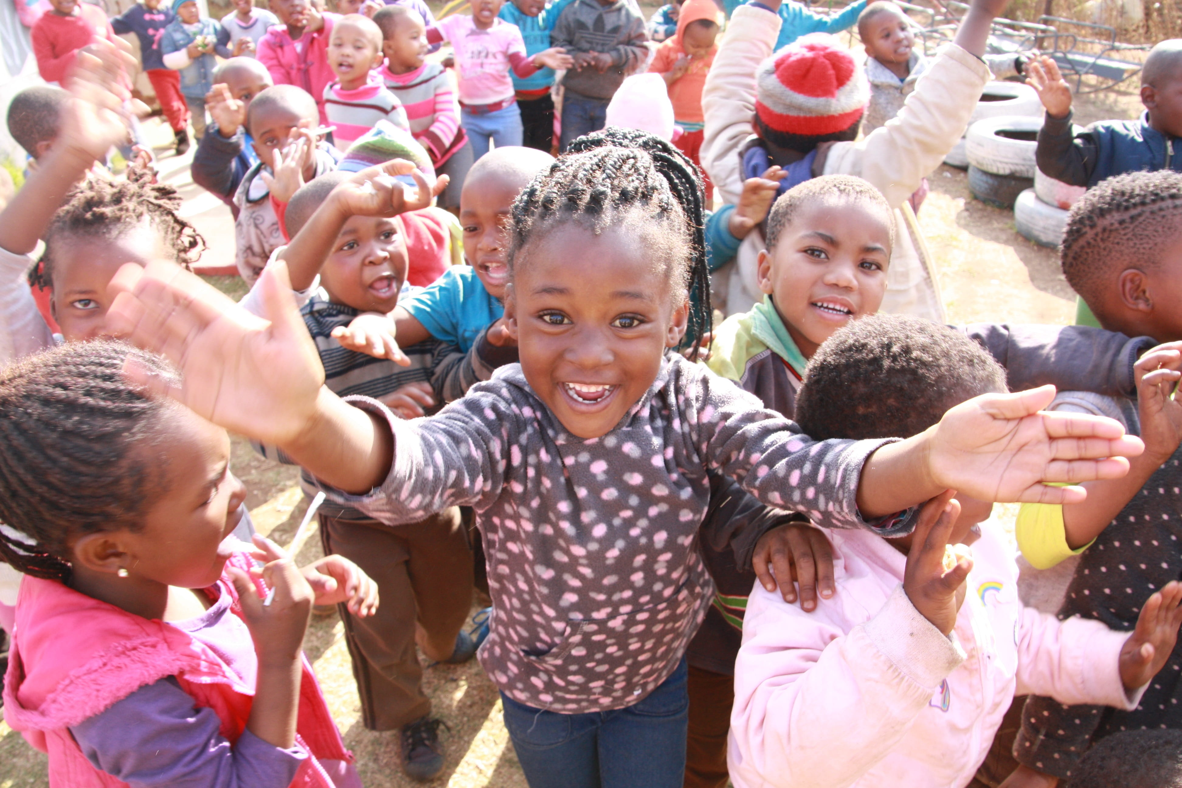 happiness, looking at camera, africa, positive emotion, emotion, childhood, leisure activity, outdoors, girl, cheerful, welcome, human arm, togetherness, HD Wallpaper