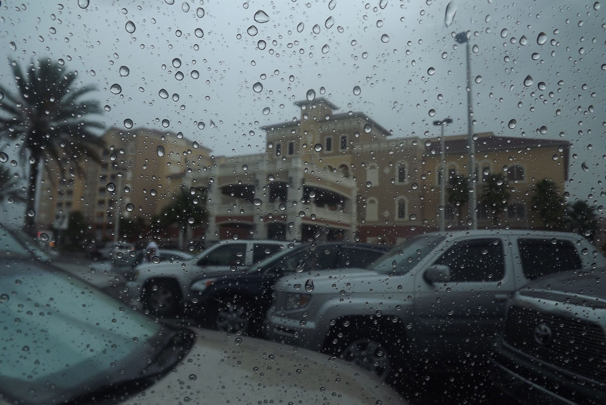 land vehicle, hotel, no people, raindrop, bleary, sometimes we like days like this, sky, window, vacation, outdoors, car, cars, orlando, 1080P, nature, HD Wallpaper