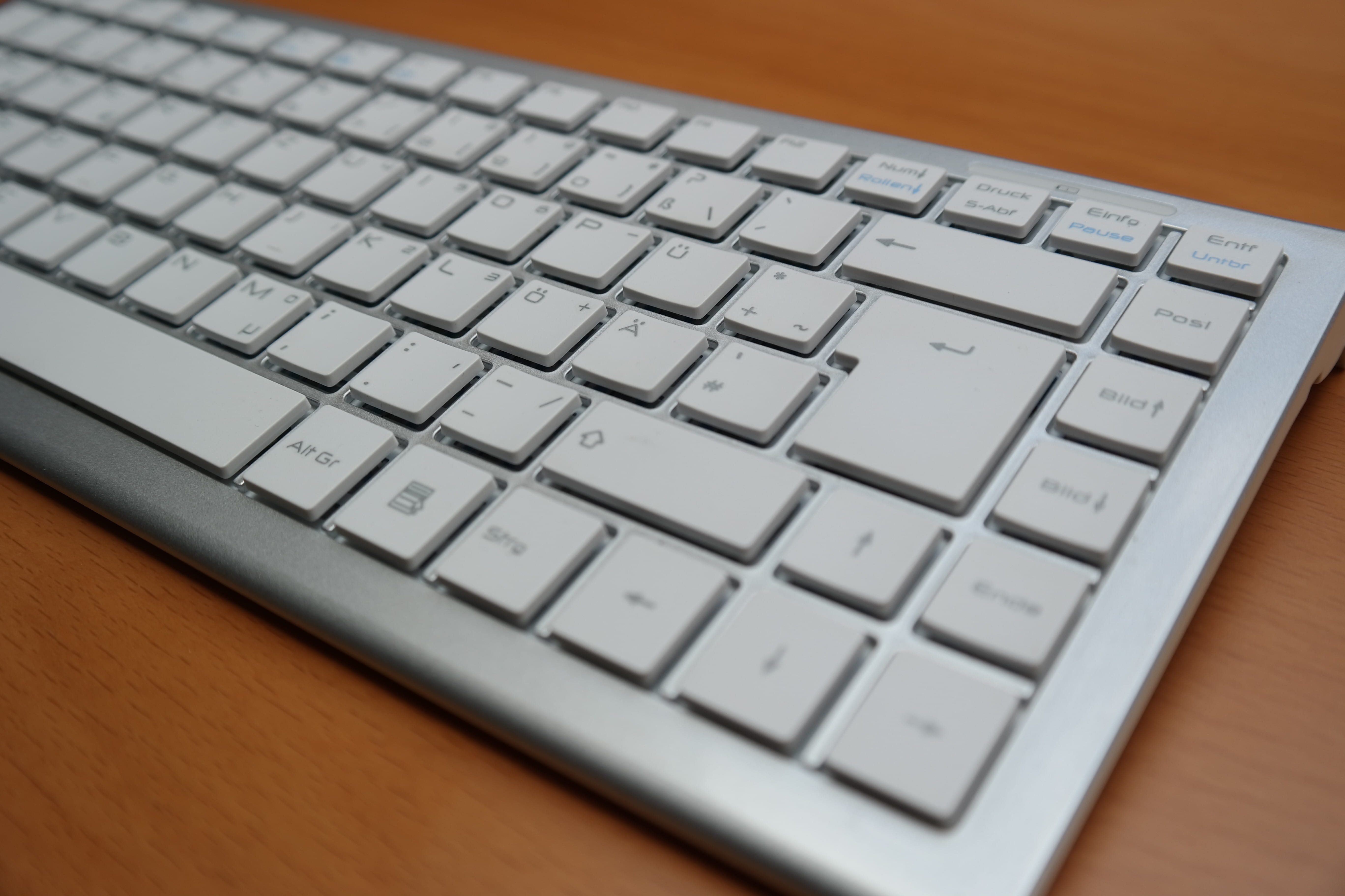 letters, apple, magic, keyboard, laptop, enter, pc, silver, hardware, no people, gray, enter button, close-up, wood - material, wireless technology, computer equipment, HD Wallpaper