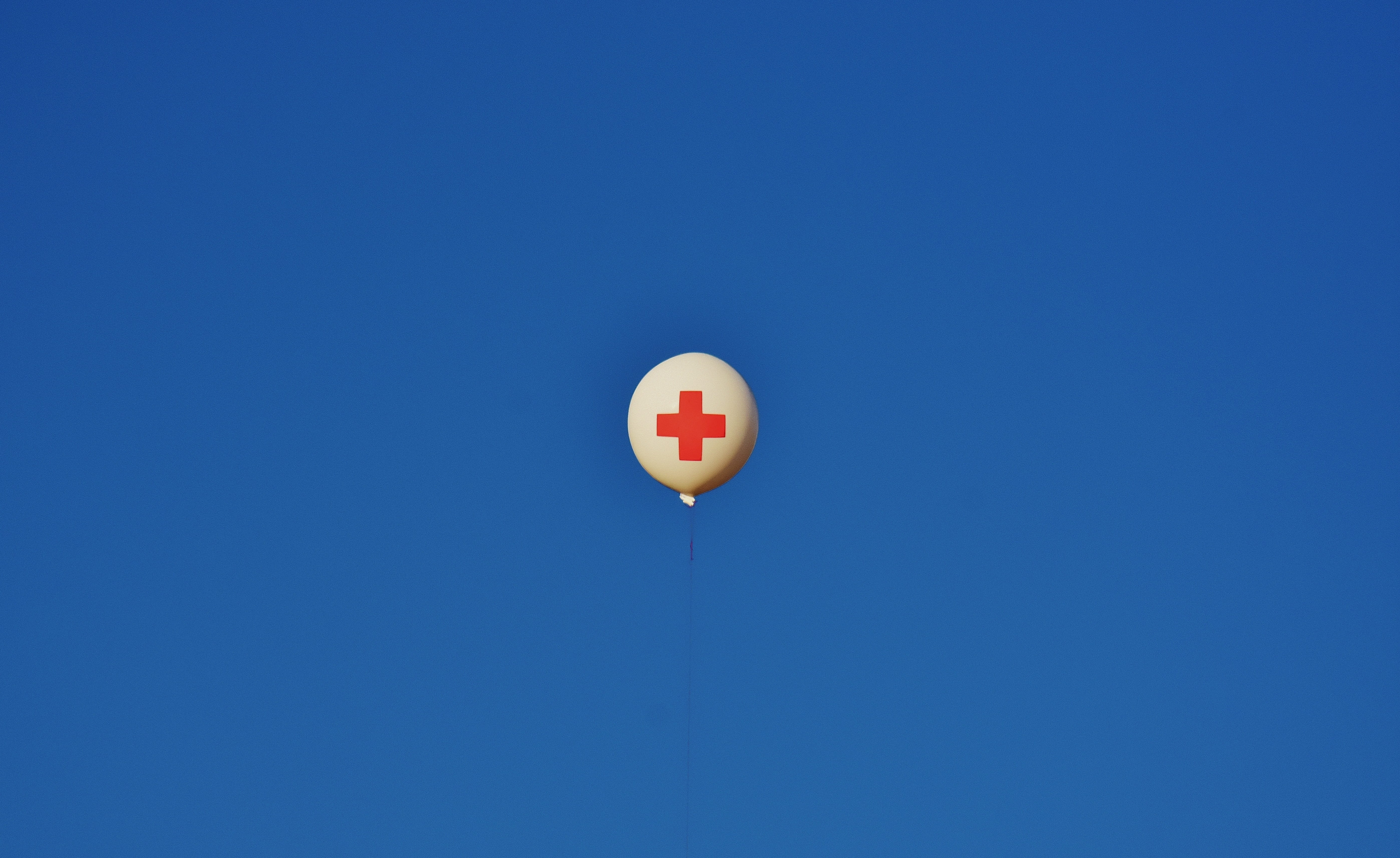 day, helium, nature, sky, outdoors, red, inflatable, emotion, low angle view, single object, 5K, First Aid, heart shape, flying, clear sky, mid-air, lifeboat station, HD Wallpaper