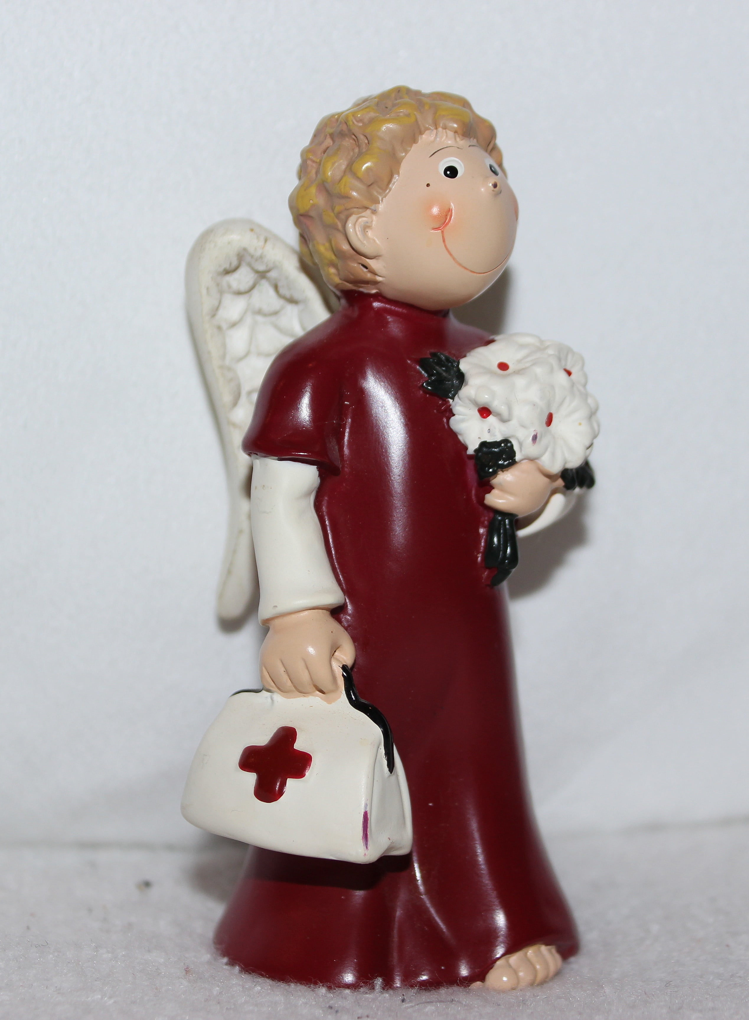 female likeness, luggage, flowers, deco, craft, red, table, creativity, angel figure, first aid, toy, indoors, confidence, sculpture, studio shot, figurine, Phone HD Wallpaper