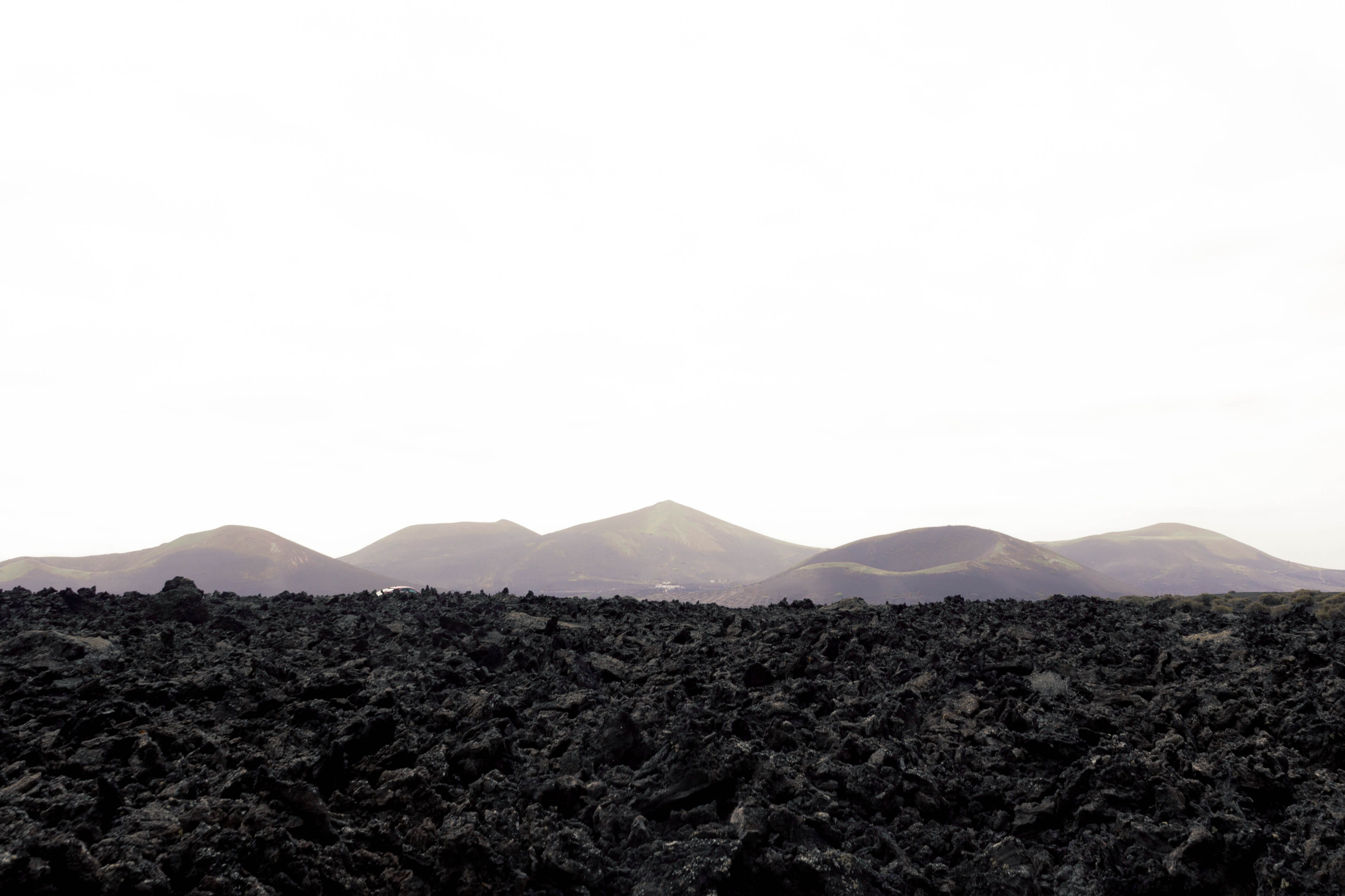 desolate, no people, volcanic, mountain range, pass, lifeless, sky, rock, spain, white, non-urban scene, black, clear sky, minimal, idyllic, daytime, barren, HD Wallpaper