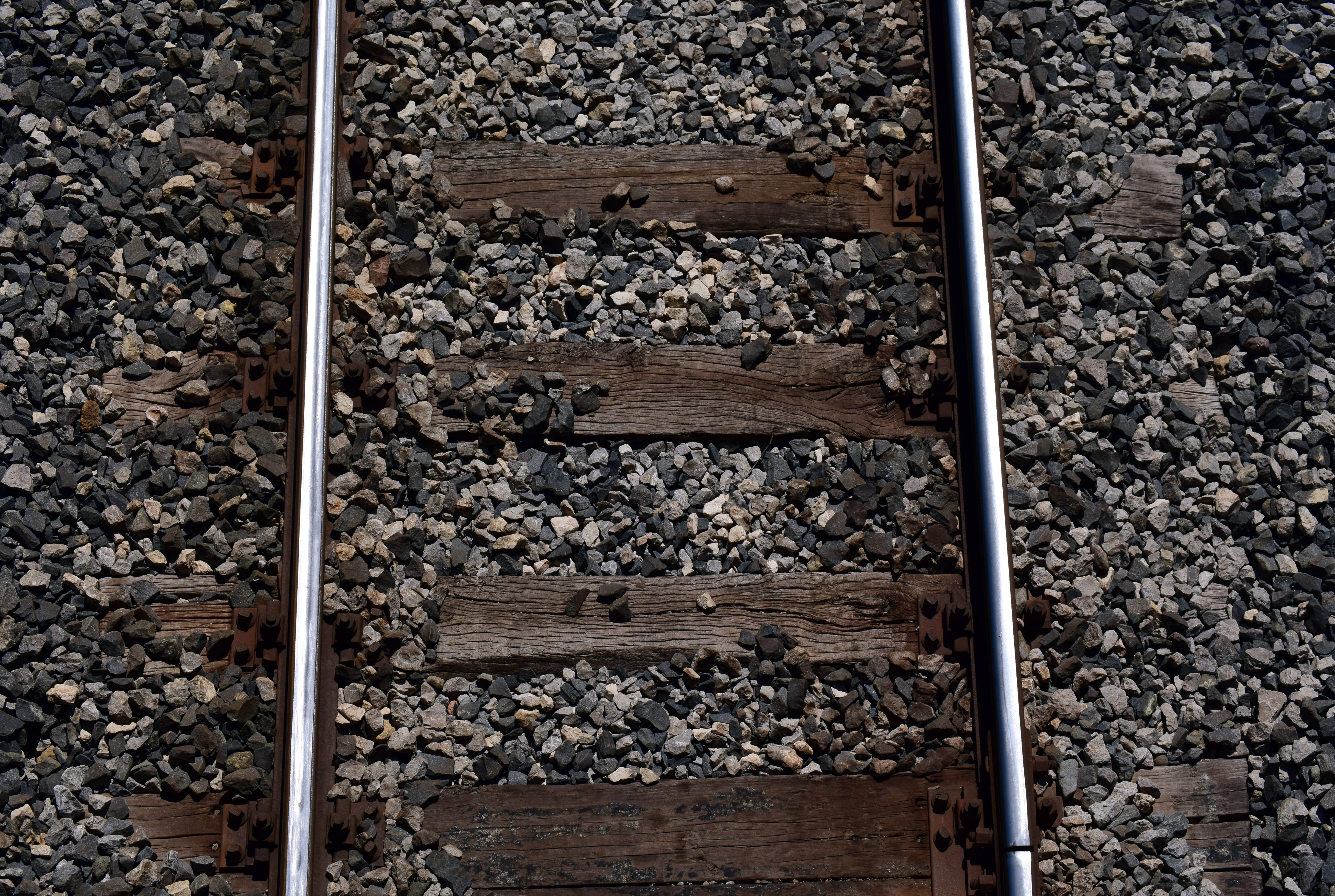 wood - material, pattern, narrow, high angle view, day, outdoors, rail transportation, gravel, stones, railway, close-up, background, train, metal, old, HD Wallpaper