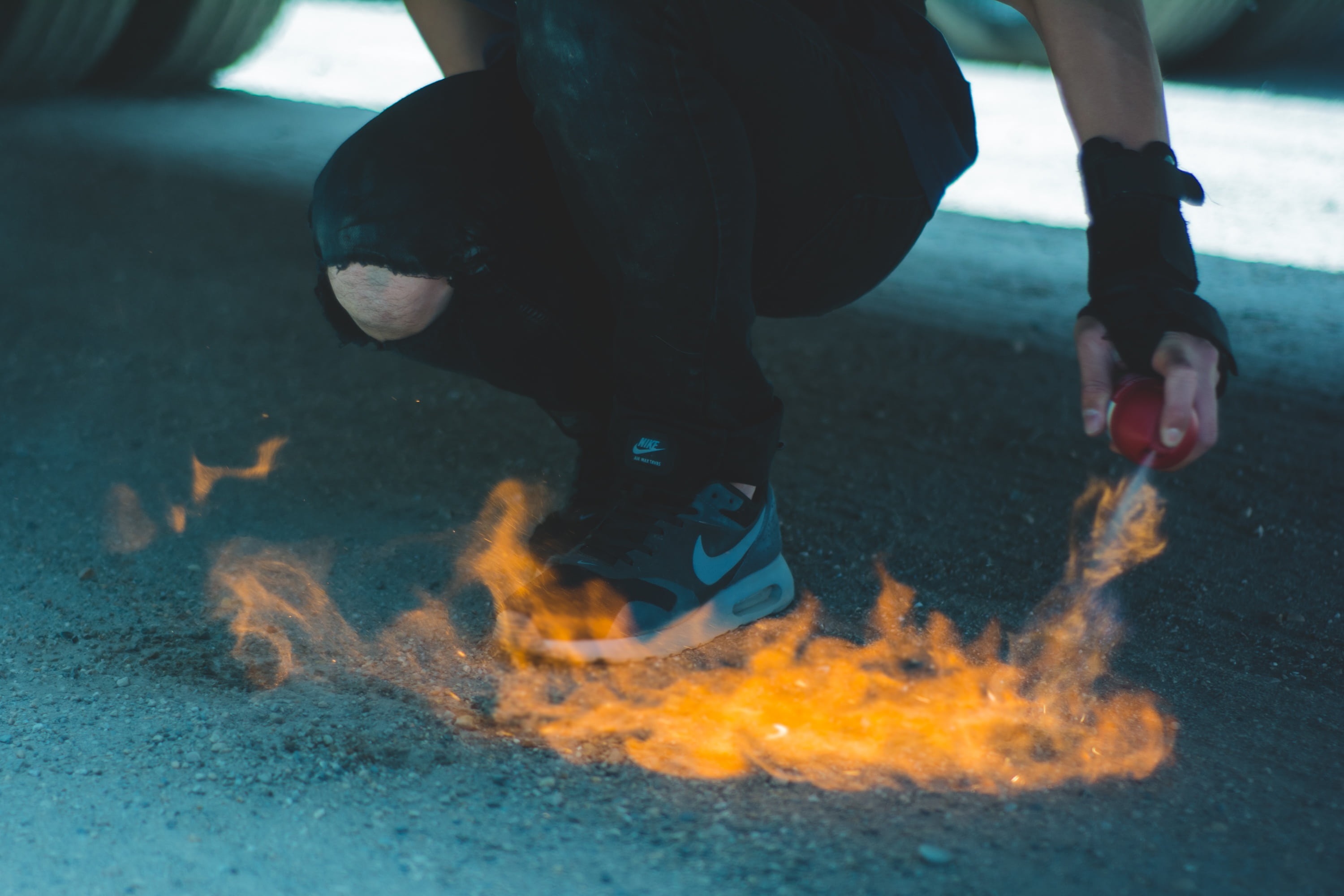 walking, one person, low section, burning, grey, one man only, flames, city, shoes, nature, human limb, adult, human foot, people, human leg, spray, ground, HD Wallpaper
