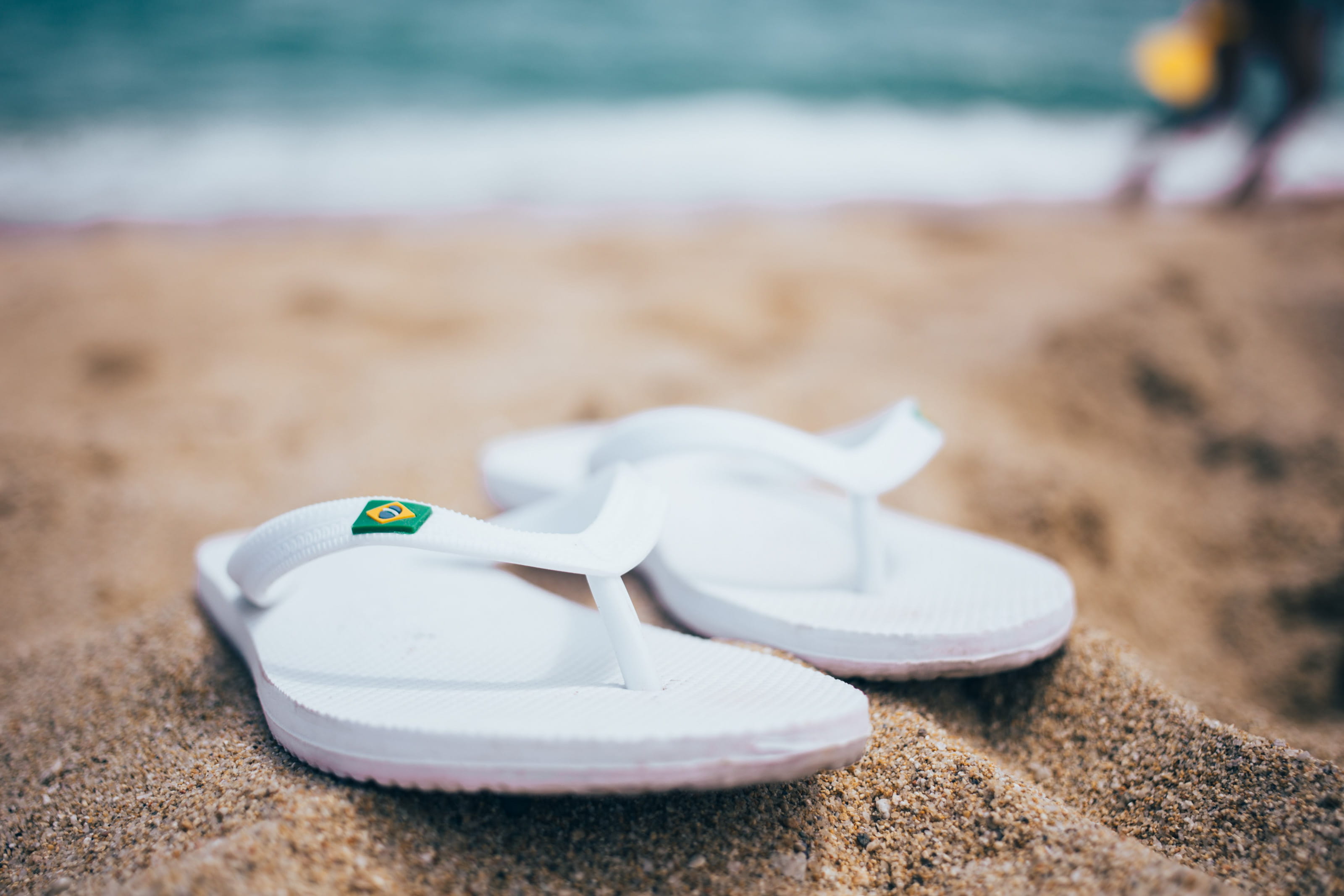 Ocean, footwear, flip-flops, ripples, shoe, sandal, blurred-background, background, lifestyle, summer, Coast, pair, relaxation, sandals, selective focus, HD Wallpaper