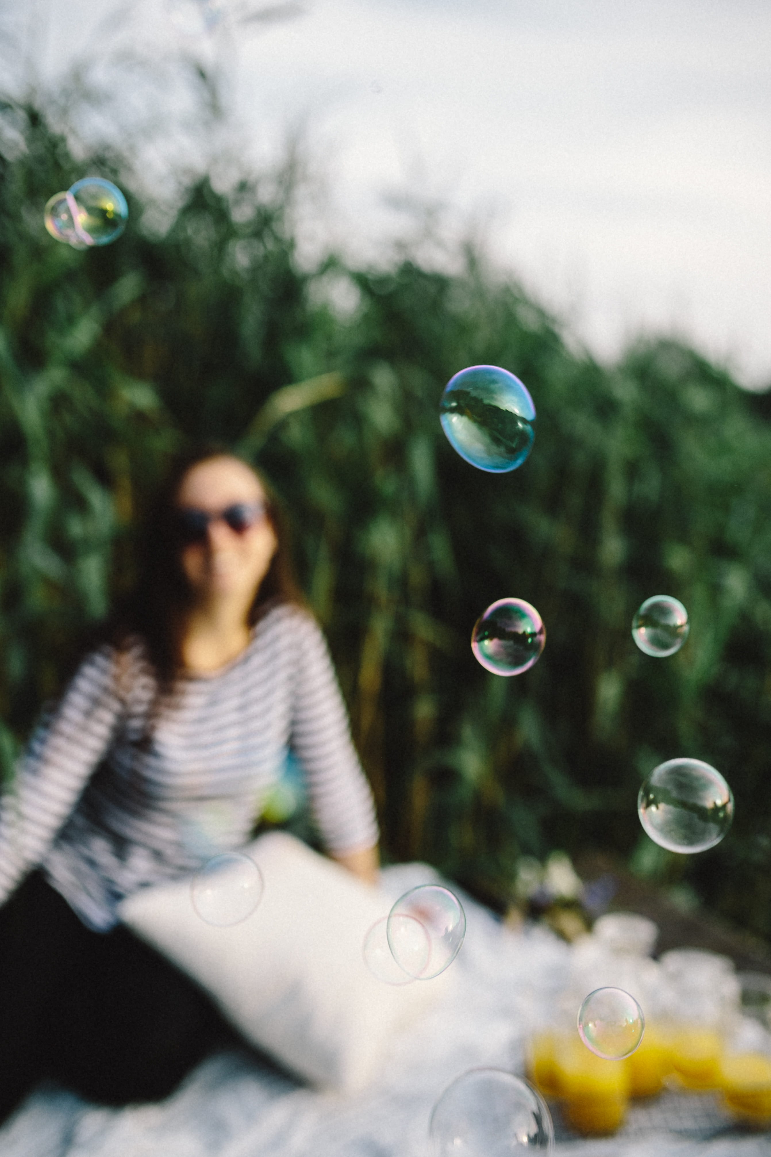 bubbles, blowing, happiness, glasses, lifestyles, happy, girl, summer, leisure activity, women, young women, one woman only, vacations, playful, fragility, Phone HD Wallpaper