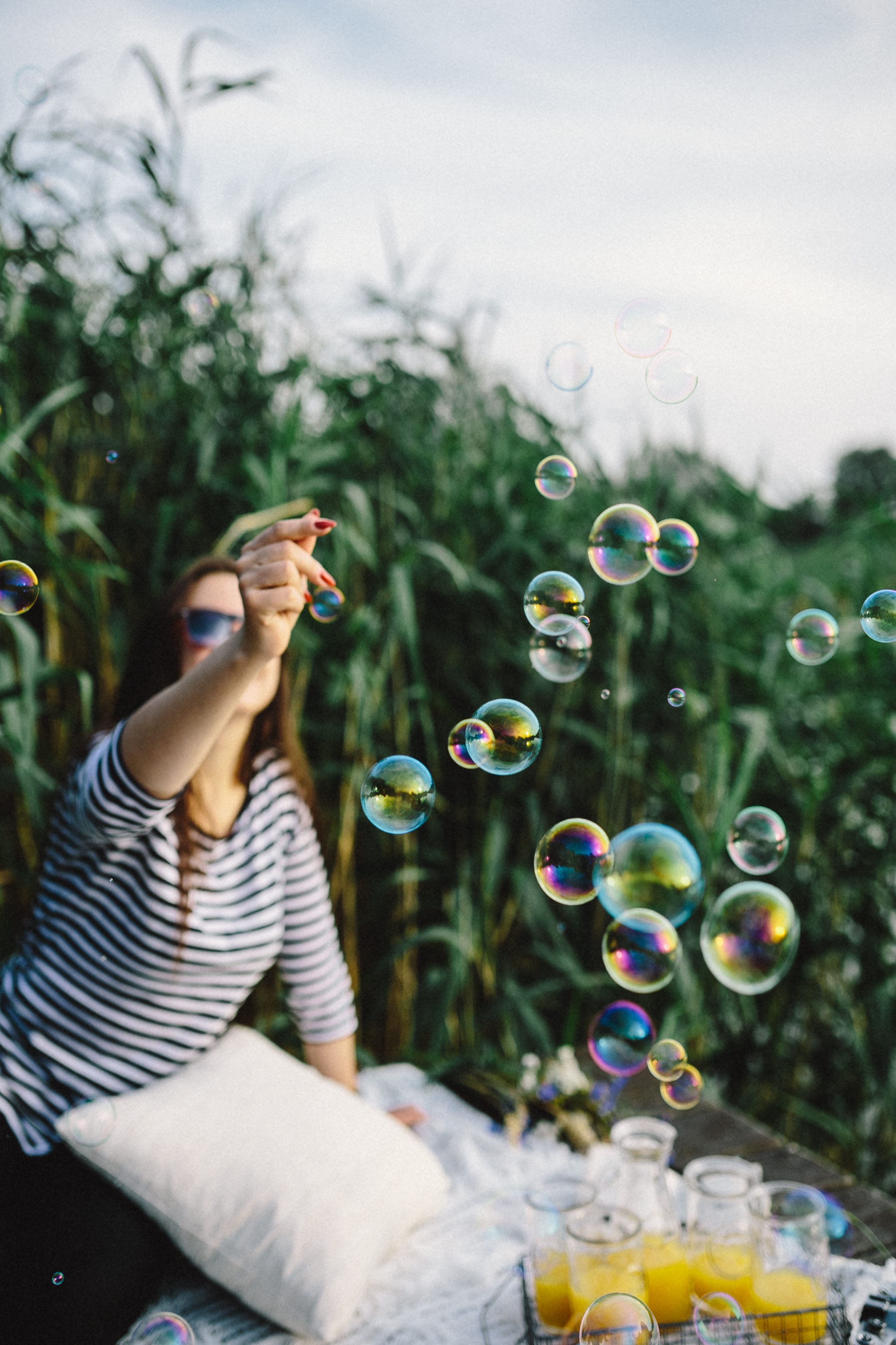 enjoyment, green Color, joy, Having fun, playful, bubble, bubbles, adult, childhood, bubble Wand, vulnerability, soap bubbles, day, casual clothing, real people, Phone HD Wallpaper
