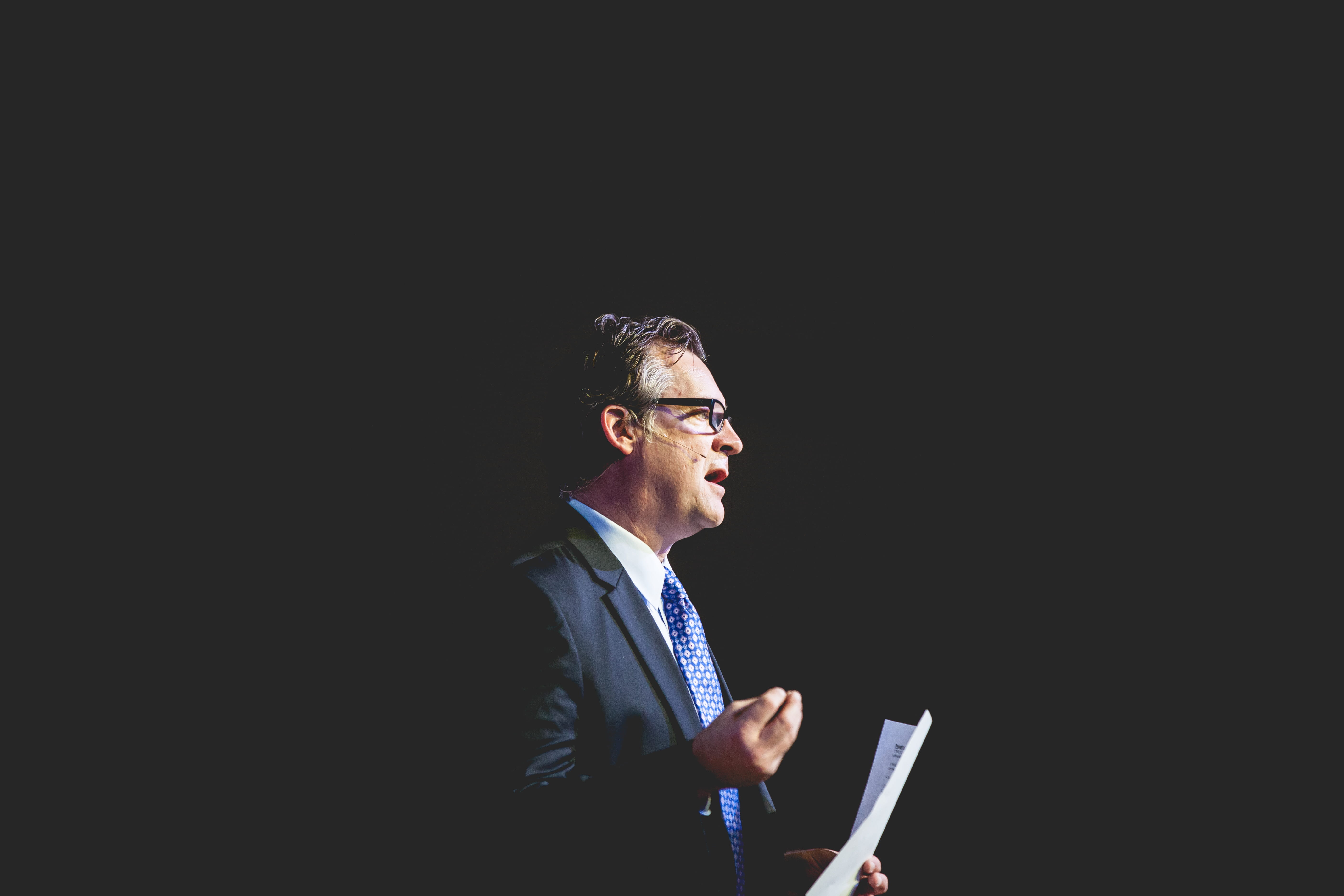 mature adult, eyeglasses, adult, preacher, silhouette, holding, mature men, okc first church of the nazarene, 5K, copy space, well-dressed, black background, HD Wallpaper
