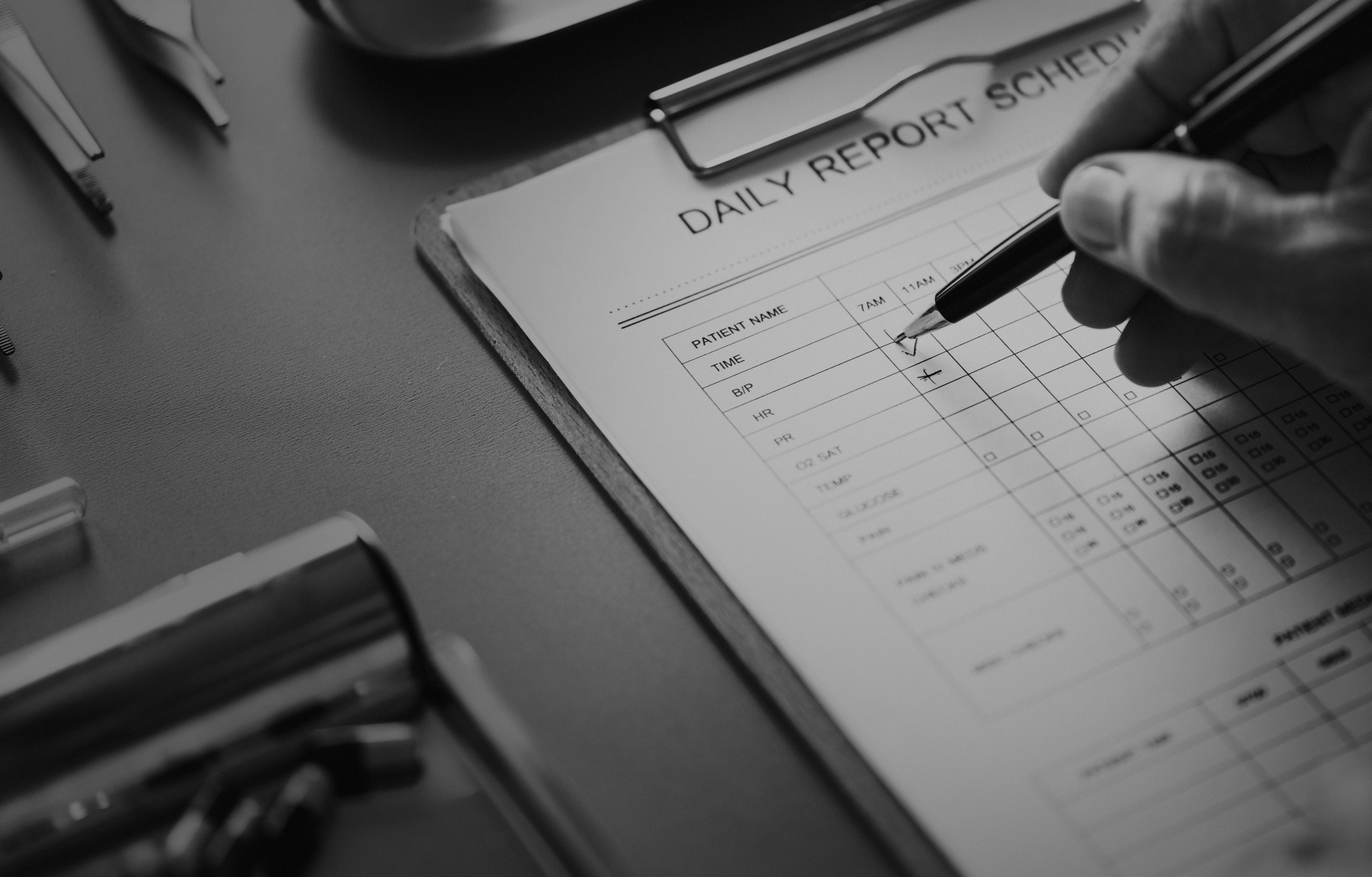 high angle view, indoors, daily report, hand, text, gray scale, holding, care, finger, table, selective focus, doctor, communication, writing, pen, healthcare, HD Wallpaper