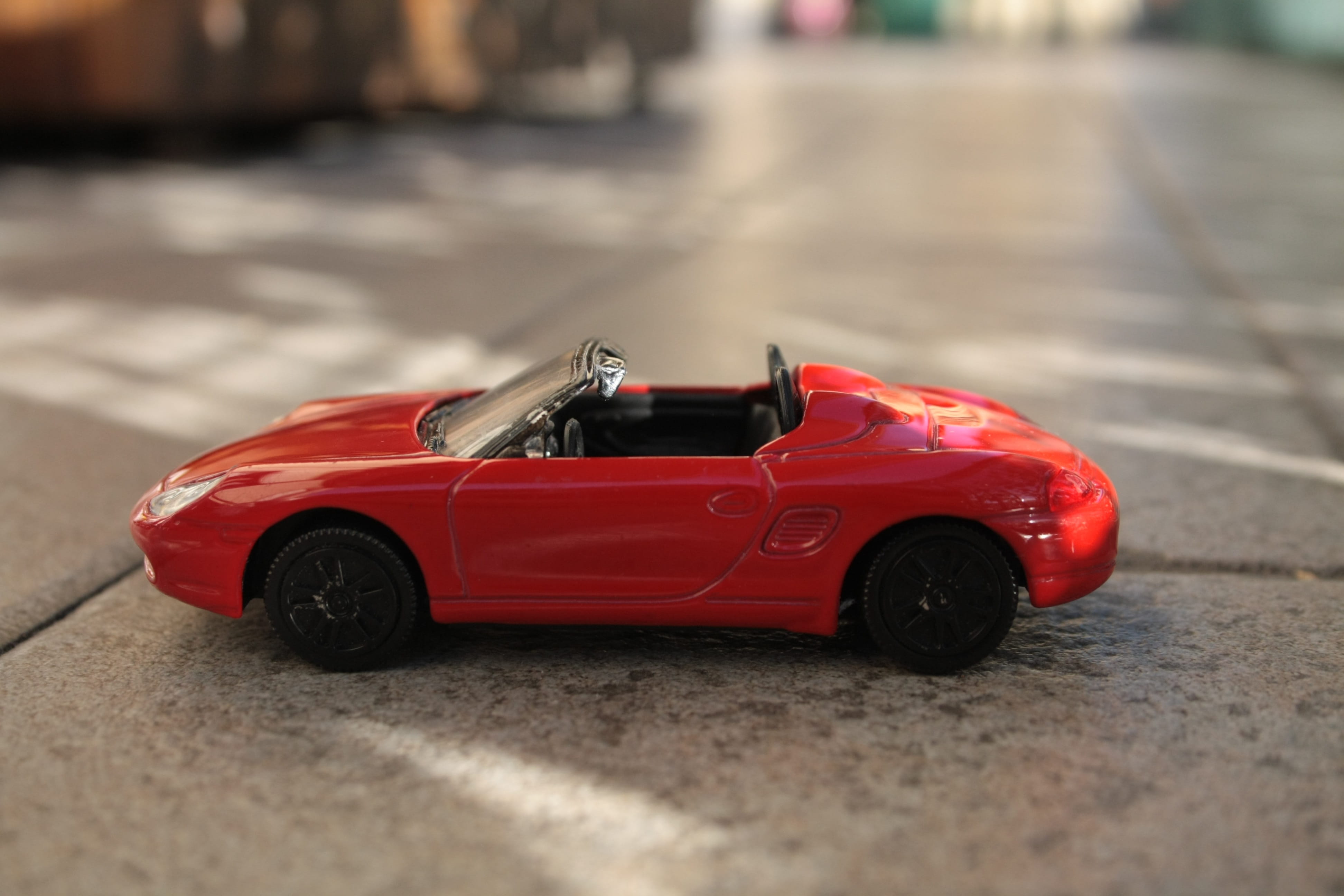 street, sun, day, insurance, ray, incidental people, Ferrari, motor vehicle, game, selective focus, transportation, Toy Car, surface level, single object, HD Wallpaper