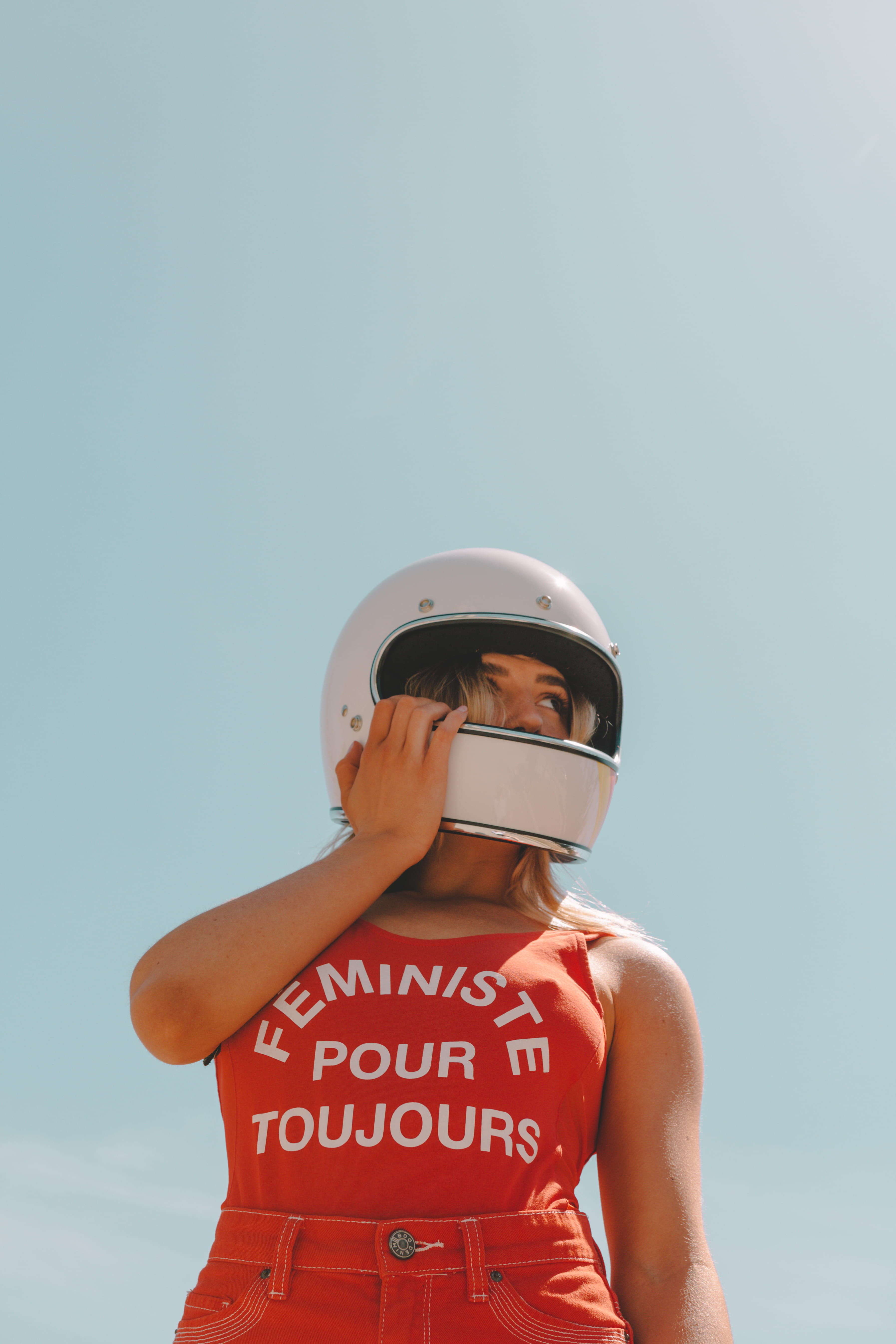 young women, waist up, motorcycle, headwear, helmet, lifestyles, girl, wearing, portrait, leisure activity, blue, front view, film, 5K, person, pose, woman, Phone HD Wallpaper