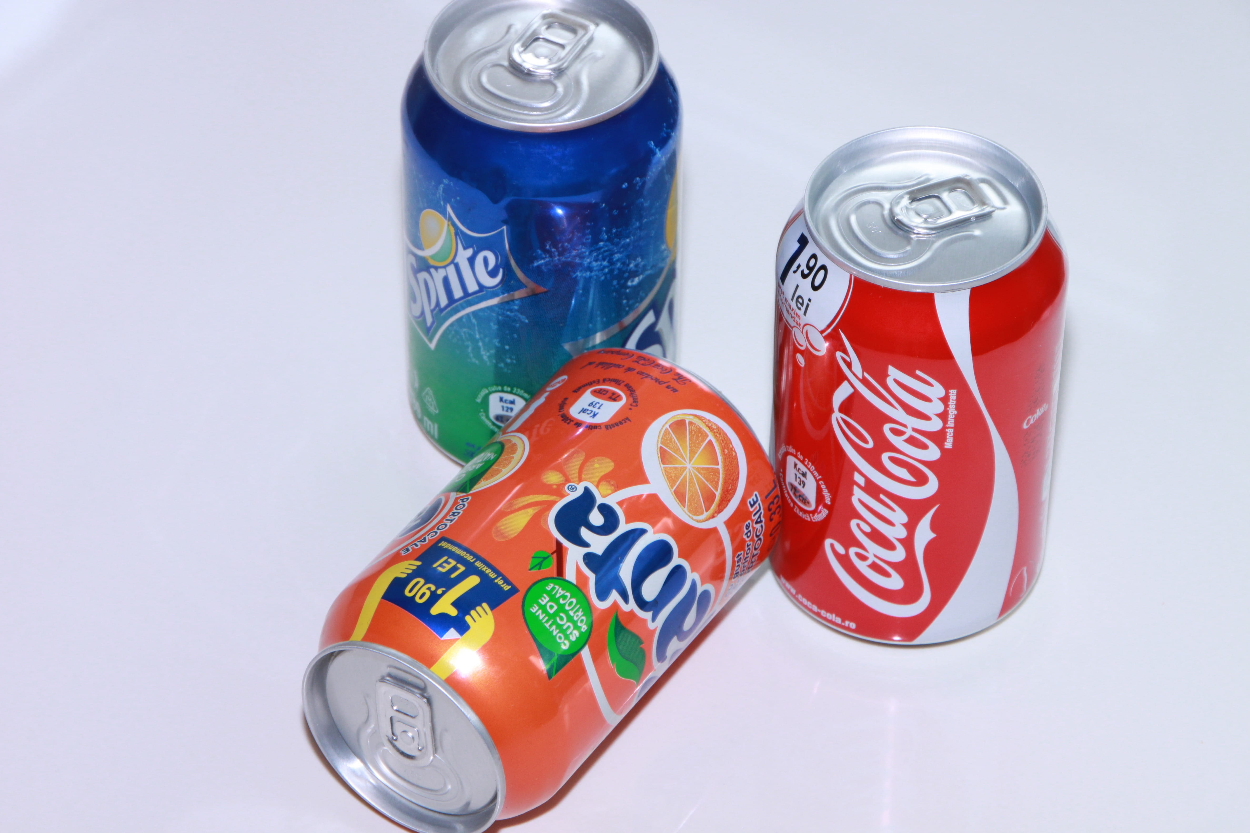 high angle view, Drink, coca, Can, studio shot, orange, soda, indoors, group of objects, close-up, bottle, refreshment, Coca, two objects, sprite, no people, HD Wallpaper