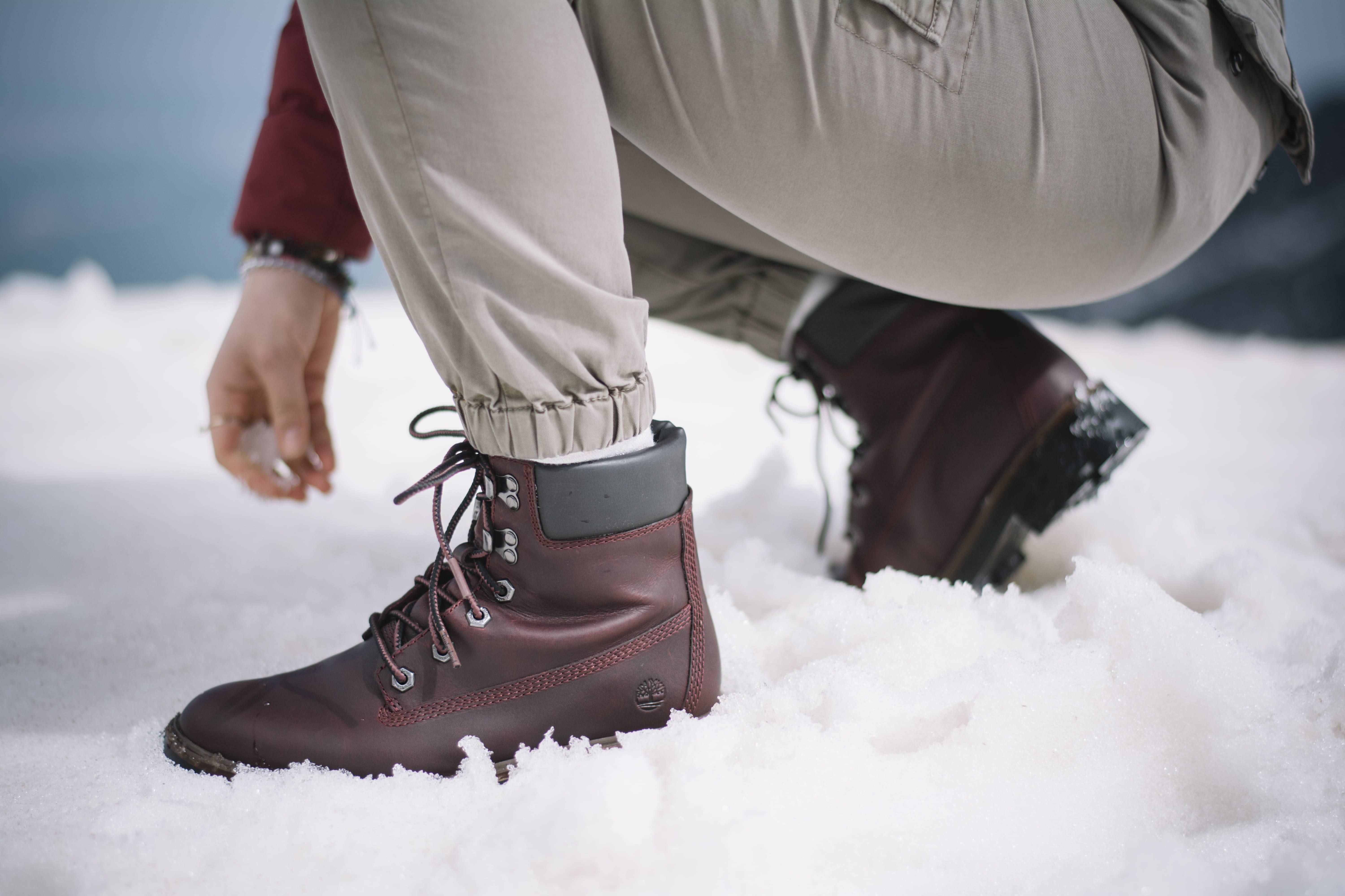 sleeve, spoke, ankle, footwear, human leg, 5K, body part, person, boot, apparel, snow, lifestyles, human body part, human, timberland, winter, leisure activity, HD Wallpaper