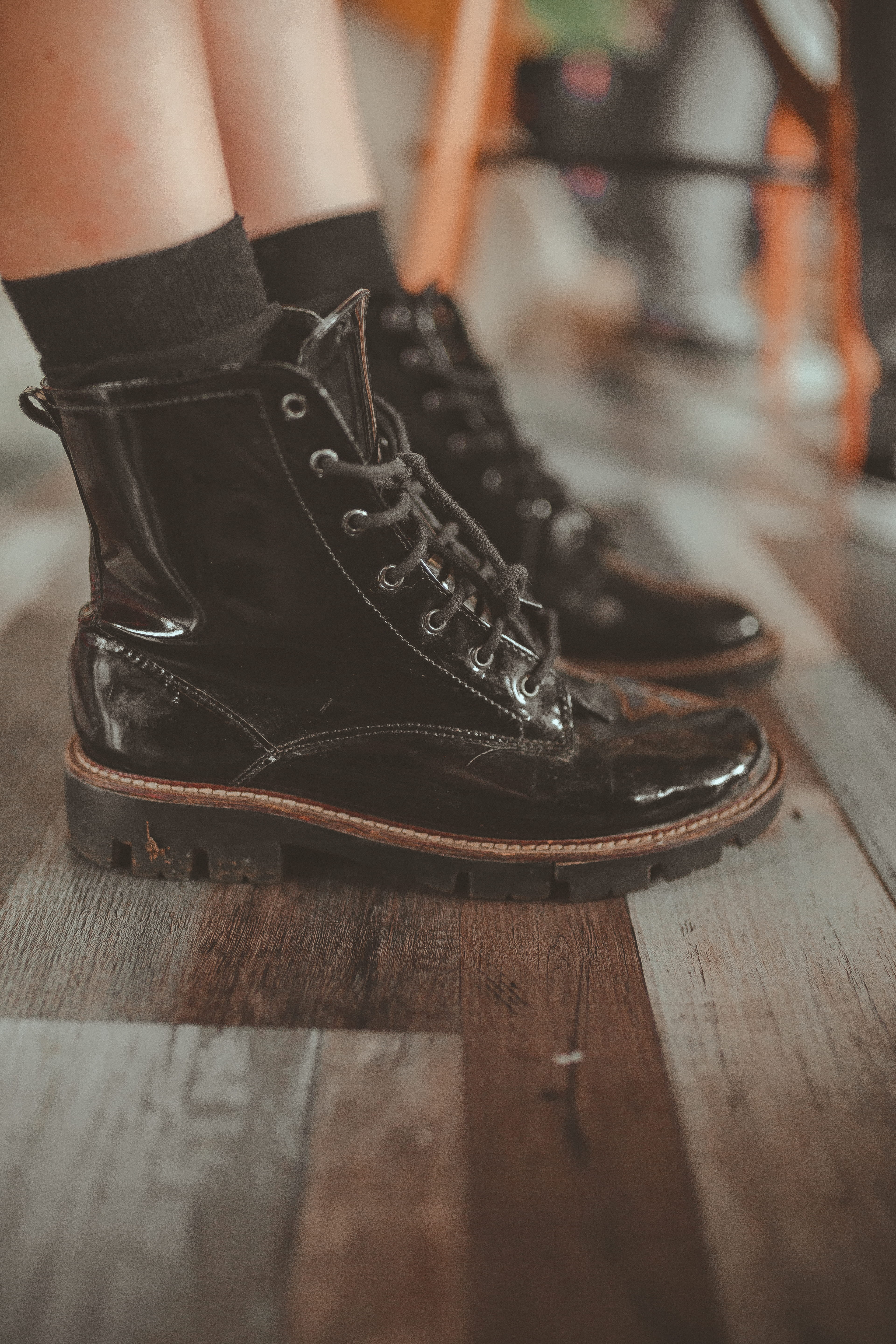 selective focus, wood - material, wear, patent, shoelace, style, human leg, one person, indoors, person, low section, fashionable, real people, pair, black, Phone HD Wallpaper