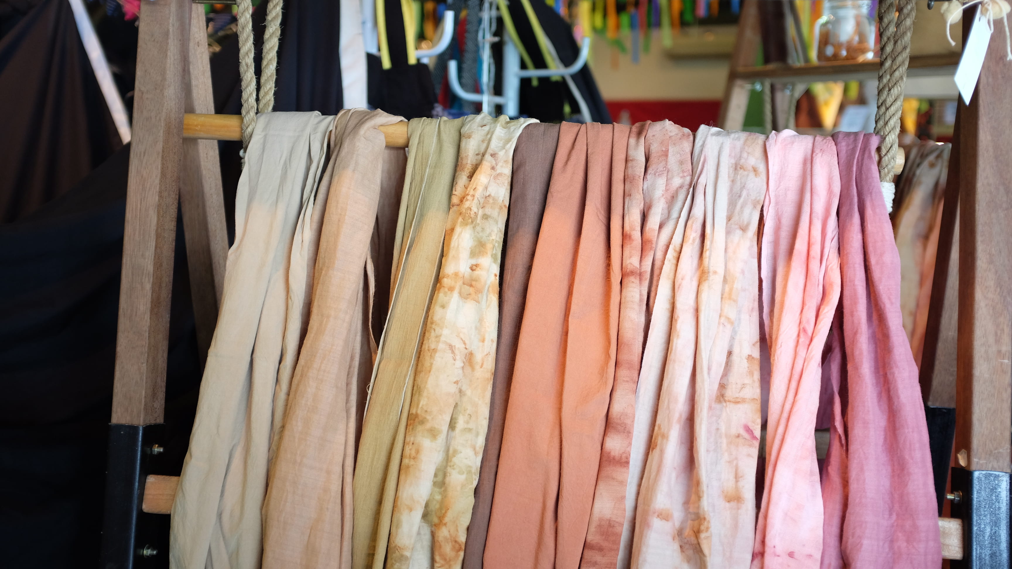 scarf, textile, wooden, close-up, scarves, clothe, industry, 2K, coathanger, assorted, no people, focus on foreground, clothing, orange, pink, variation, HD Wallpaper
