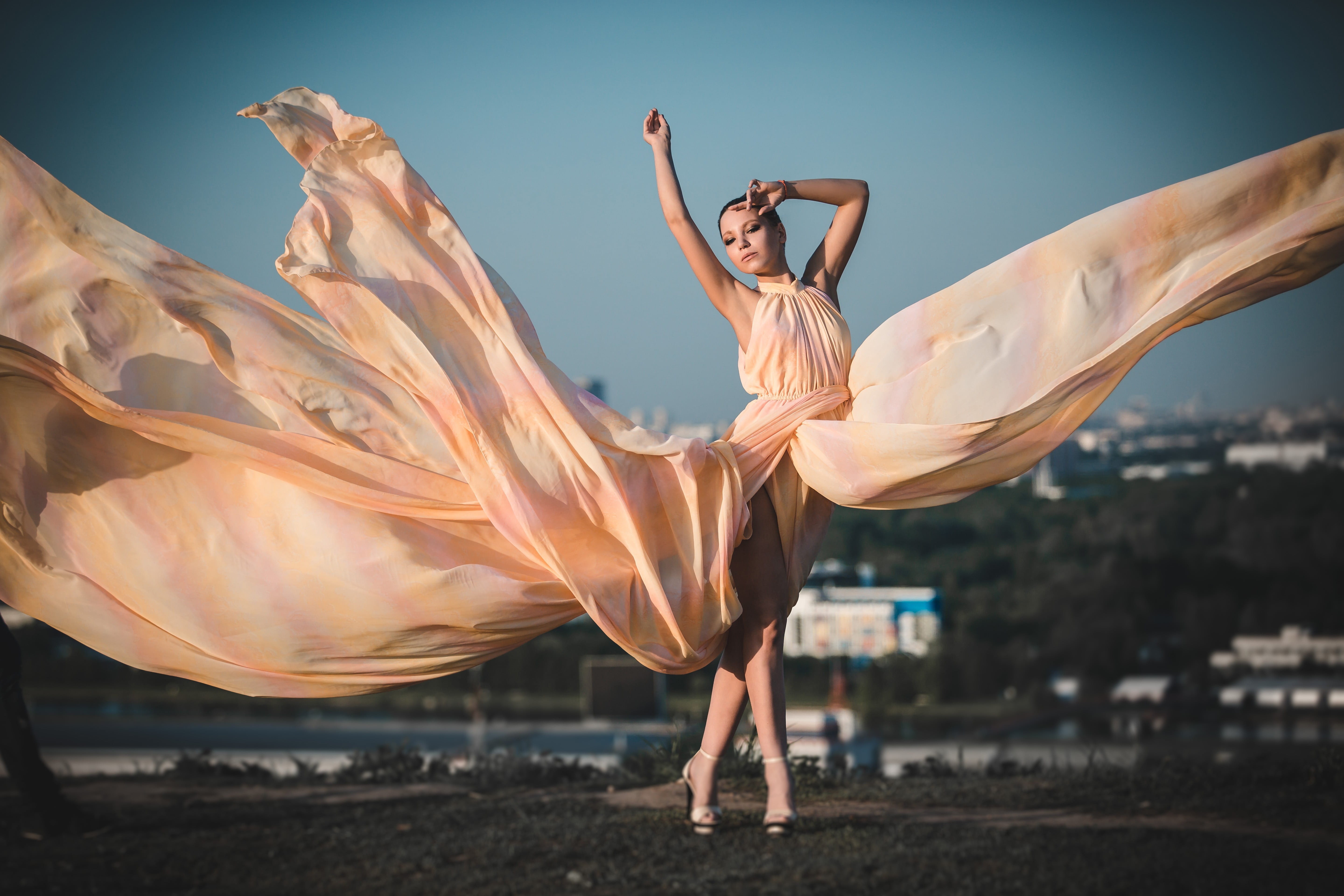dress, balance, limb, fashion, arms raised, human arm, day, sleeveless, yellow, skill, weddings, real people, wedding dress, outdoors, women, sky, leisure activity, HD Wallpaper