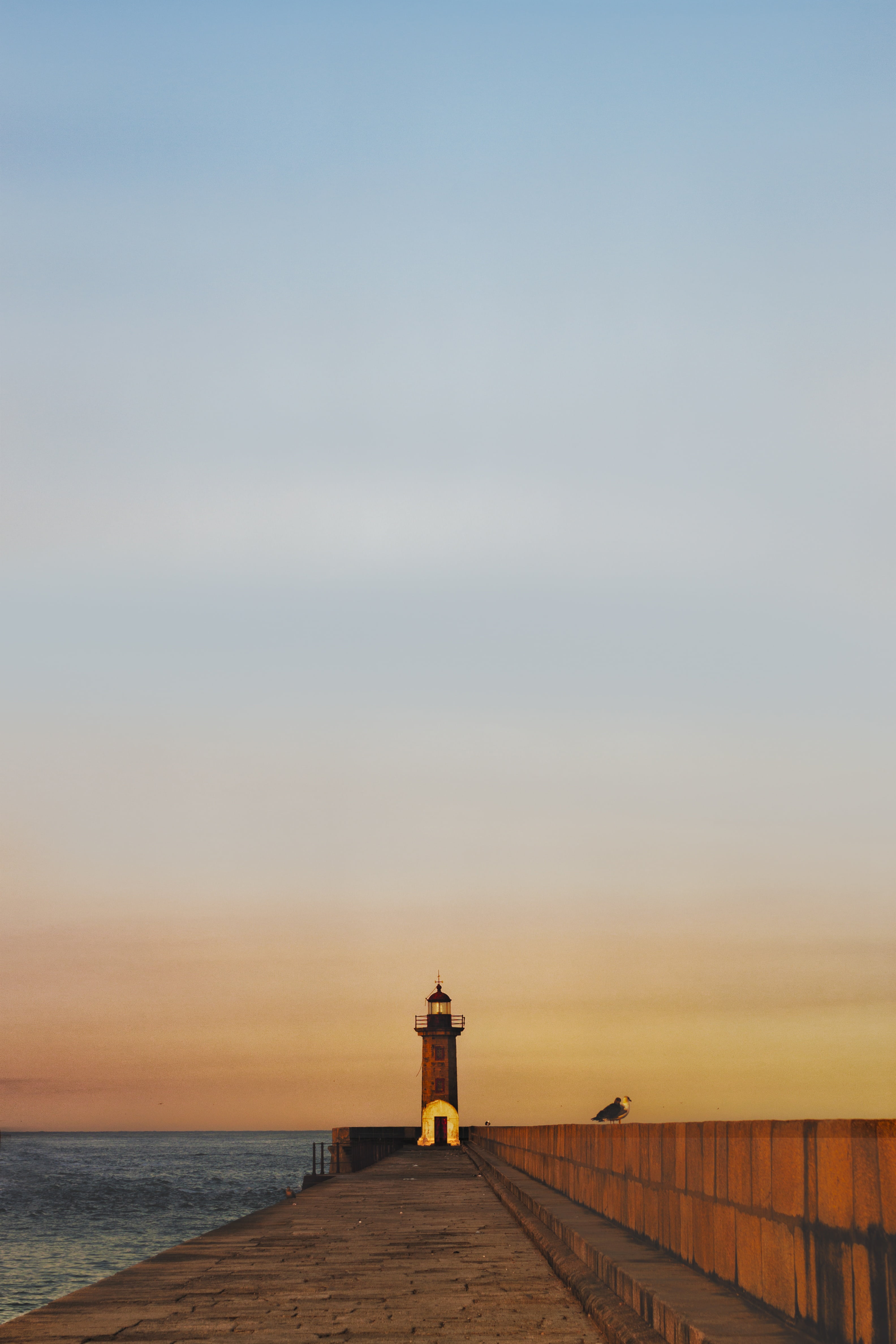romance, light, beauty, sunset, protection, ocean, nature, horizon, tower, vacation, color, sweethearts, love, safety, security, joy, built structure, lighthouse, Phone HD Wallpaper