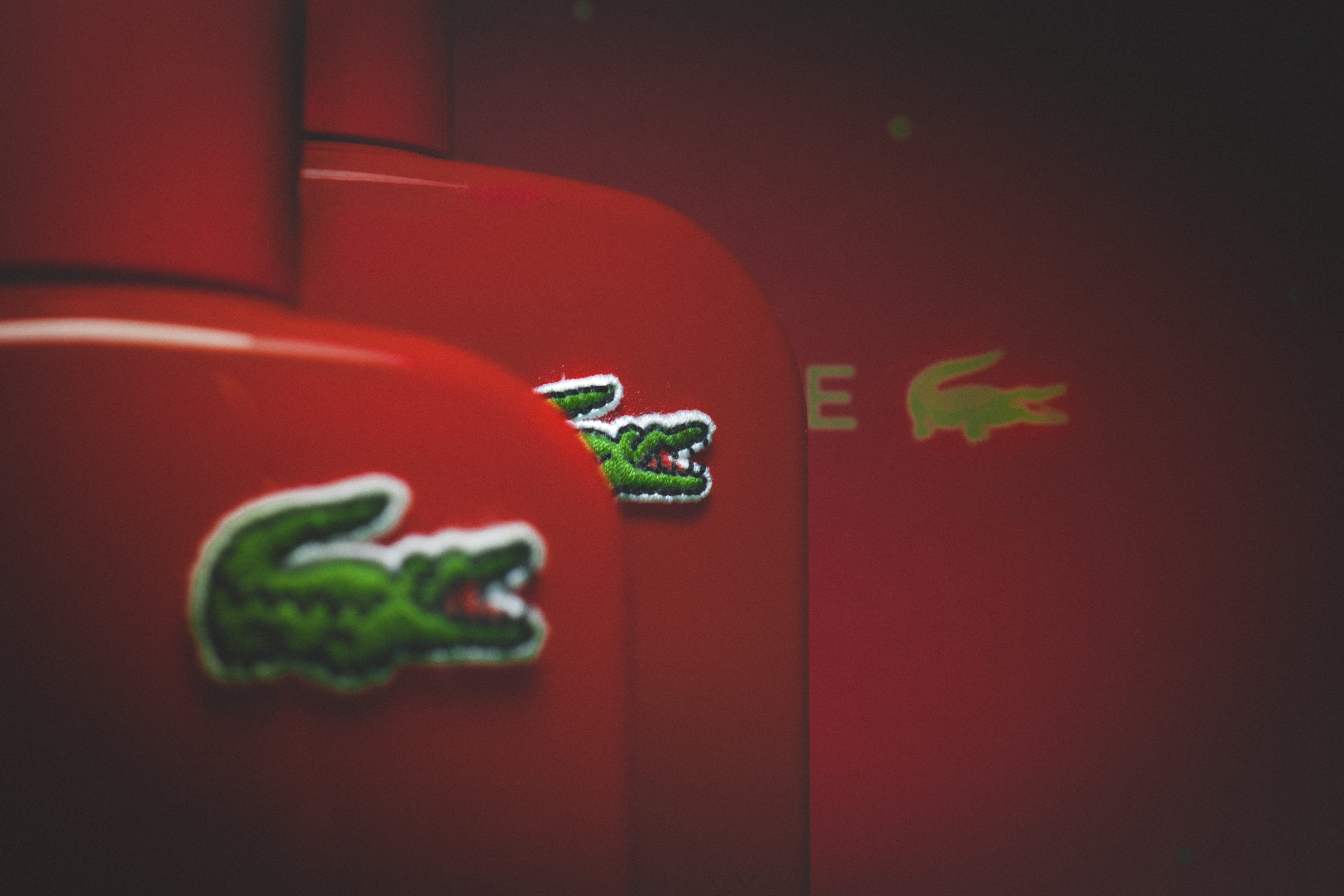 western script, lacoste, animal representation, close-up, sign, architecture, no people, red, elegance, vélizy-villacoublay, green color, france, symbol, HD Wallpaper