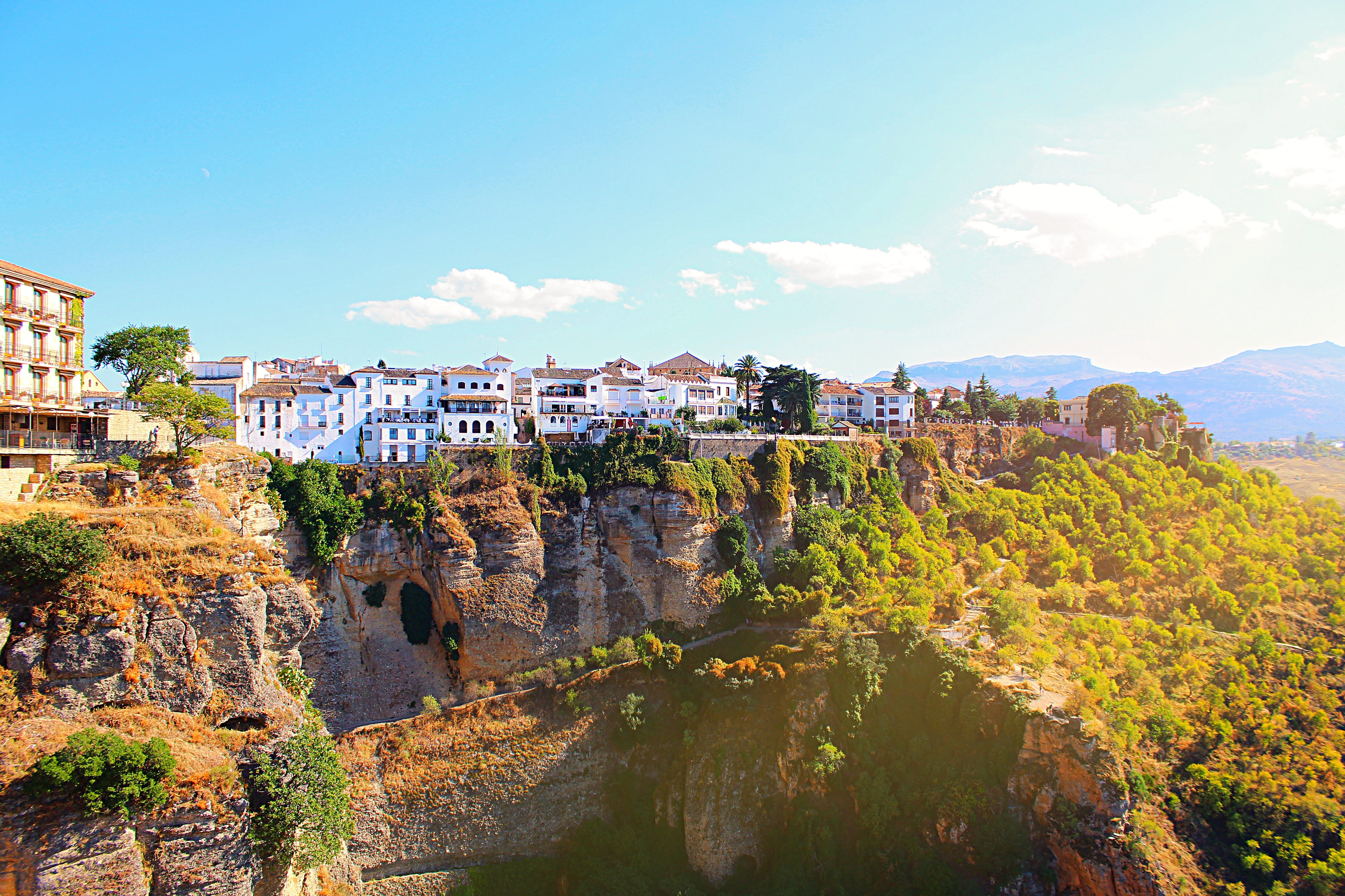 ronda, city, no people, rock, rock formation, europe, 5K, built structure, outdoors, imposing, building exterior, cloud - sky, building, spain, andalusia, HD Wallpaper