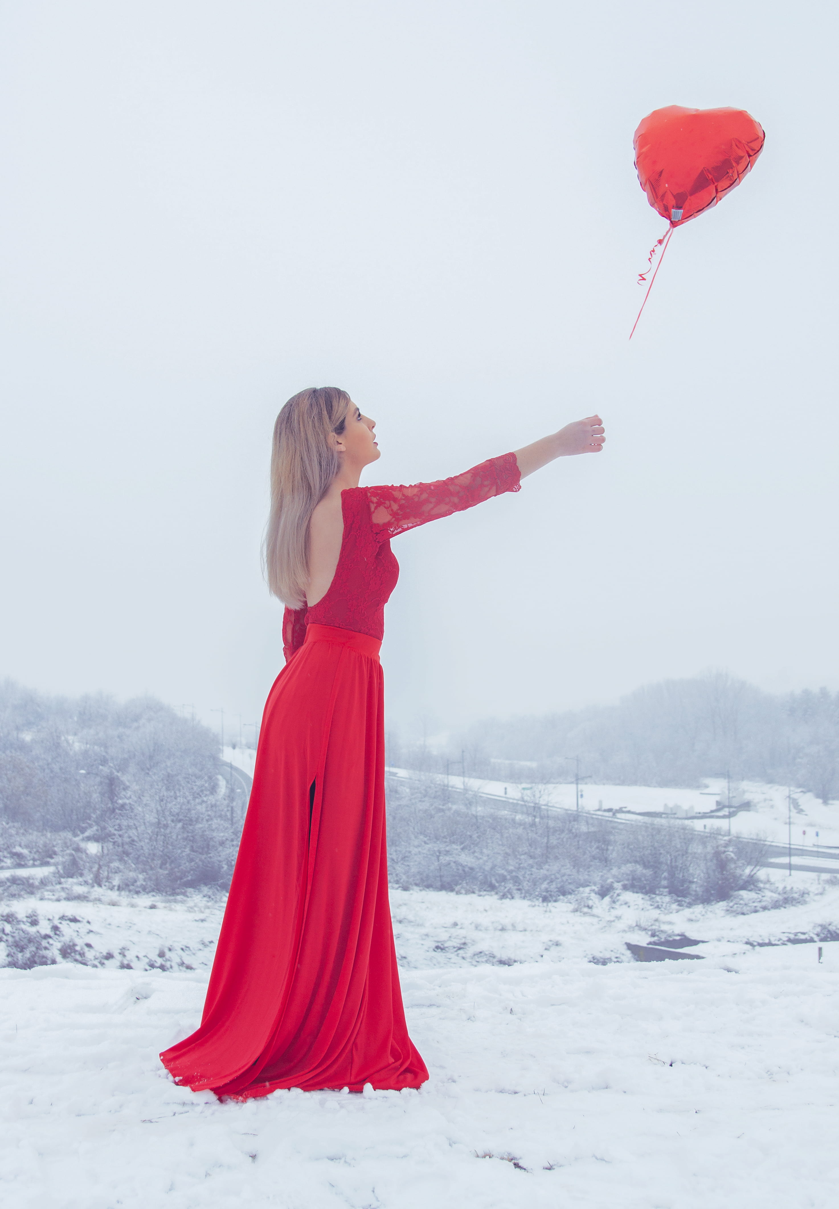 outdoors, land, 4K, young adult, letting, red, let it go, woman, one person, human arm, adult, side view, heart, dress, back, clothing, fashion, red dress, Phone HD Wallpaper