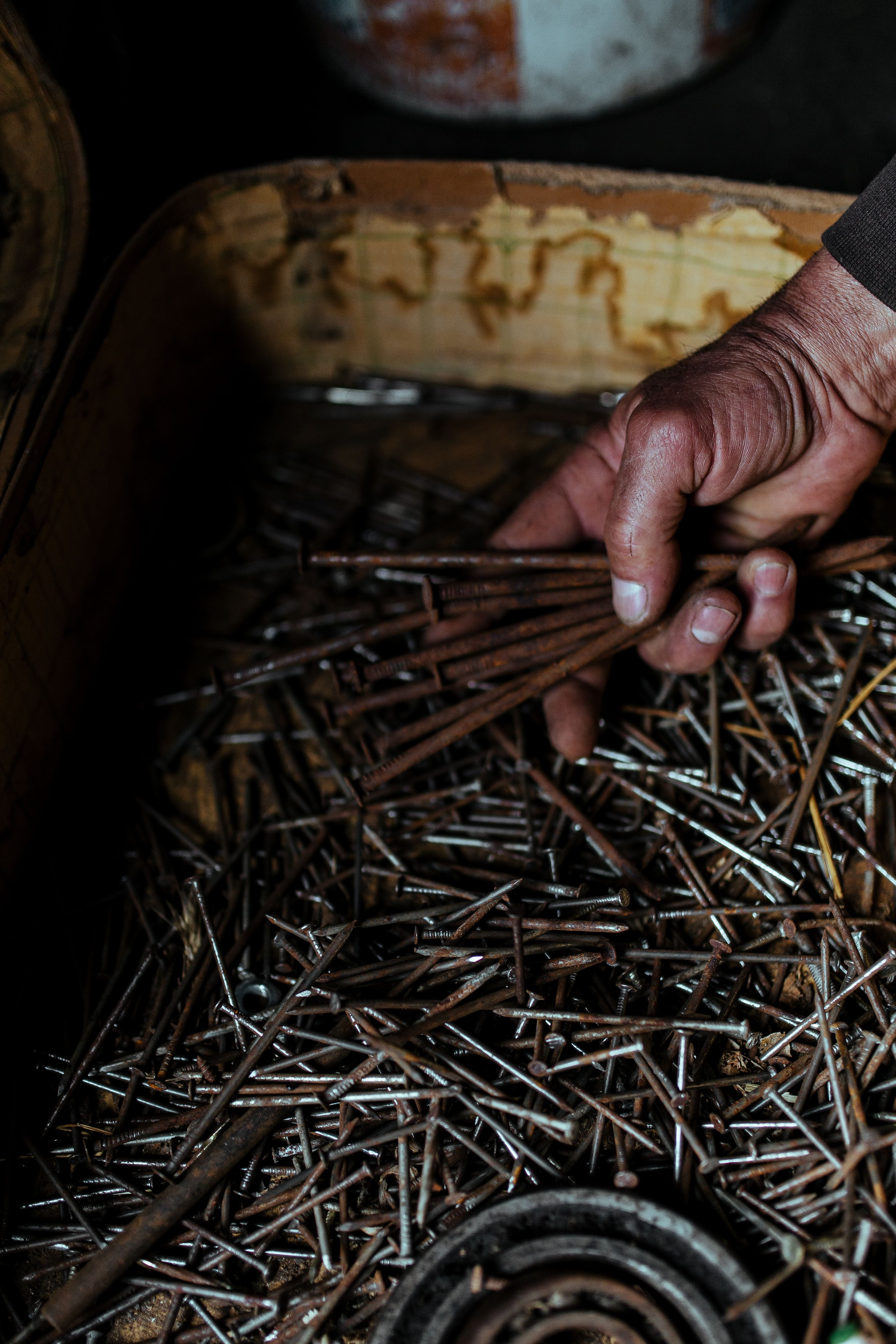 nuts, diy, craft, focus on foreground, human Hand, indoors, cultures, one person, hand, work tool, garage, nails, large group of objects, shed, human body part, Phone HD Wallpaper
