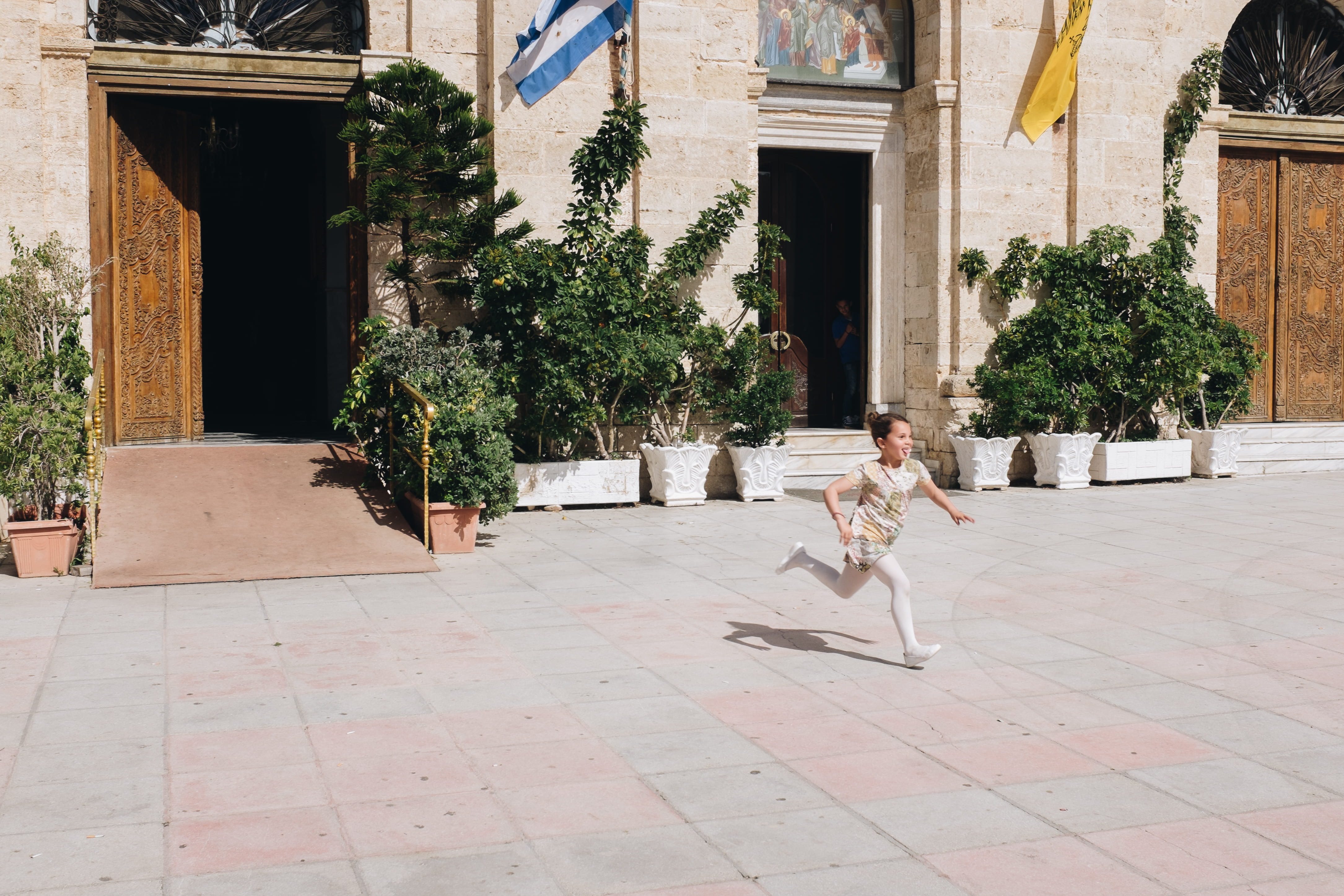 motion, home, one person, girl, young, plant, courtyard, architectural column, street, greece, running, nature, footpath, child, floor, sunlight, childhood, HD Wallpaper