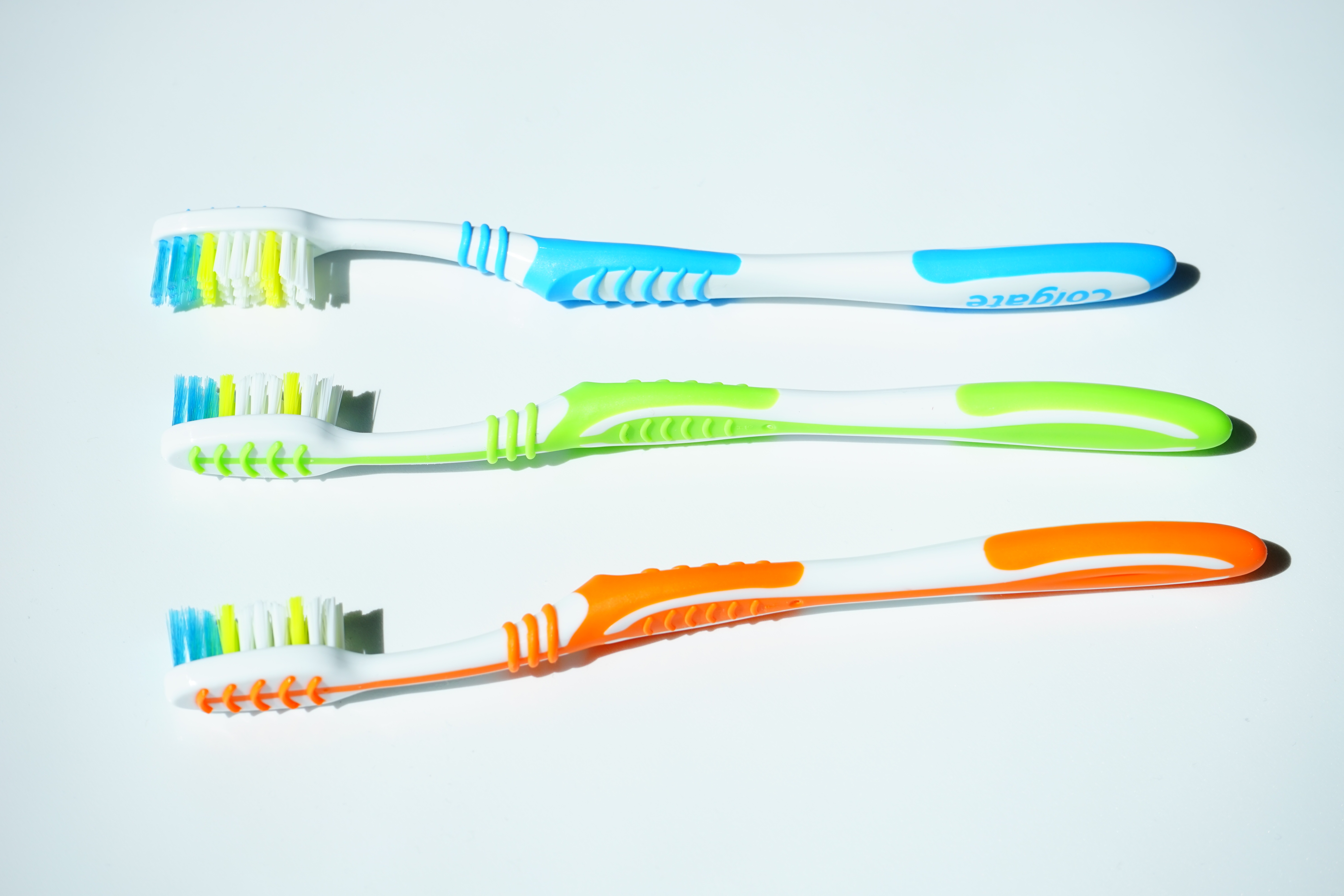 yellow, close-up, three, multi colored, equipment, red, dental hygiene, dental care, tooth brushes, body care, green, cable, indoors, choice, care, cleanliness, HD Wallpaper