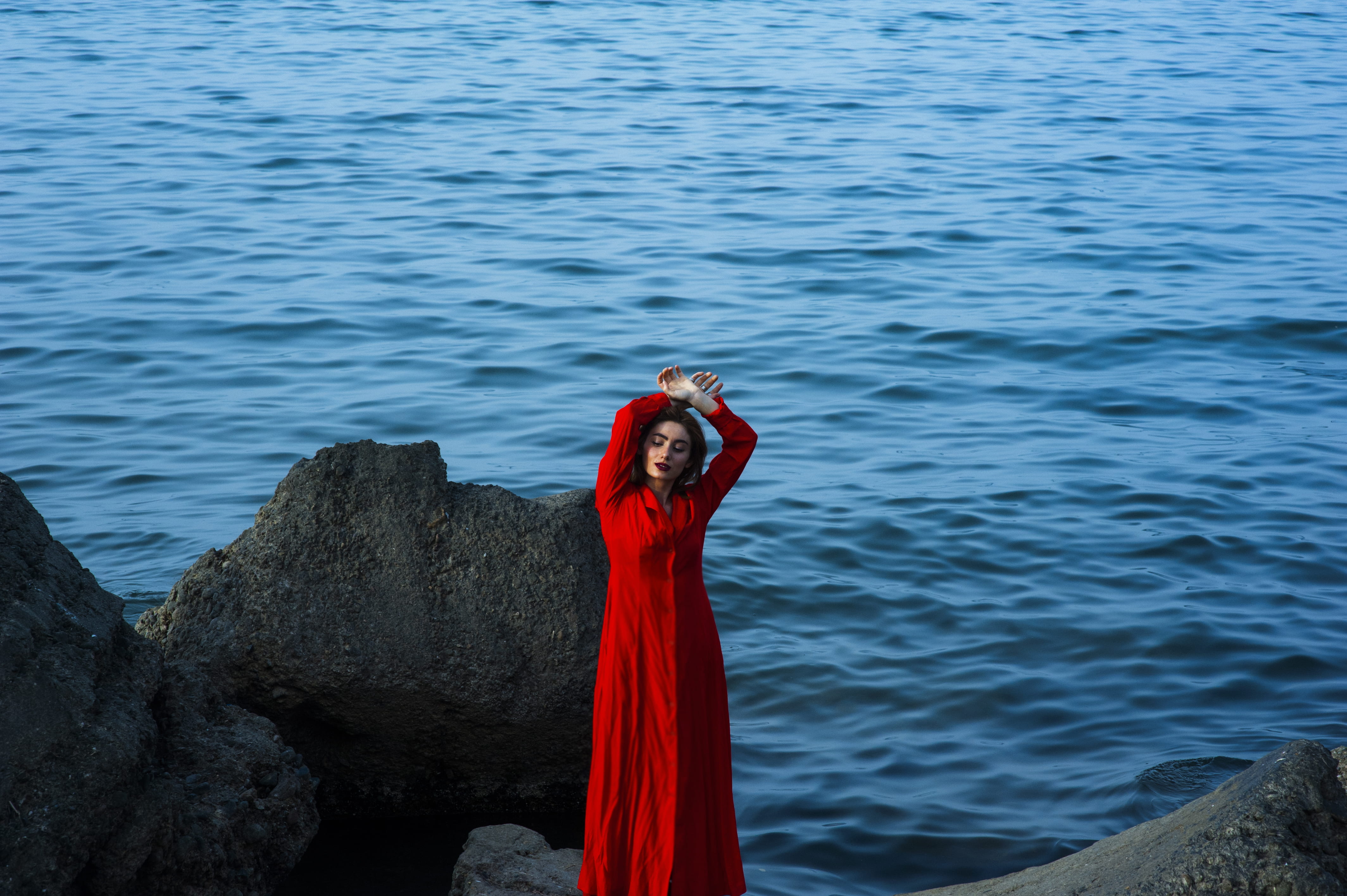 nature, sea, standing, solid, head, day, photography, focus, human arm, near, woman, women, dress, rock - object, 4K, hands, young adult, man, outdoors, HD Wallpaper