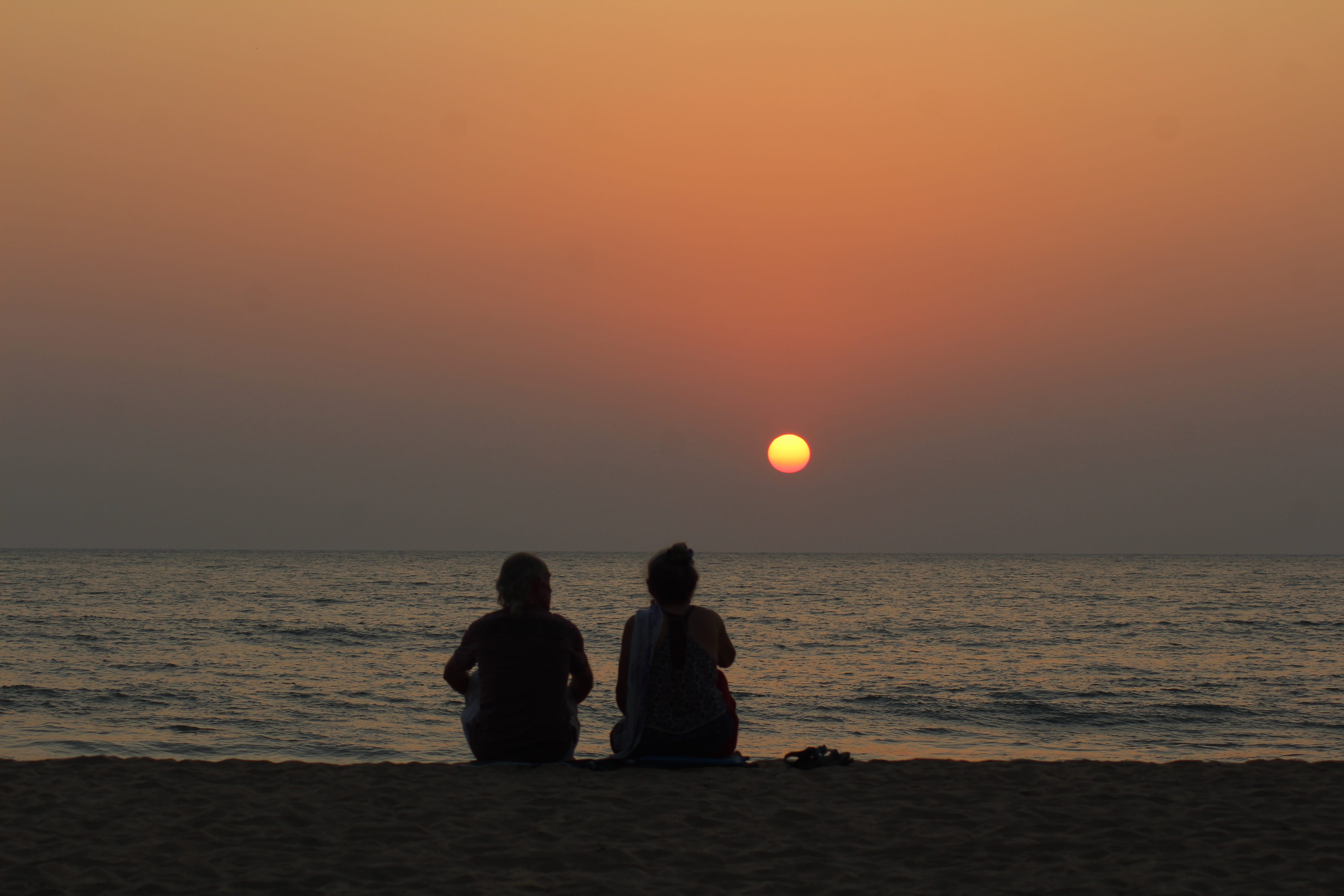 silhouette, orange color, help, positive emotion, leisure activity, love, sea, india, sun, couple - relationship, people, horizon over water, rear view, HD Wallpaper