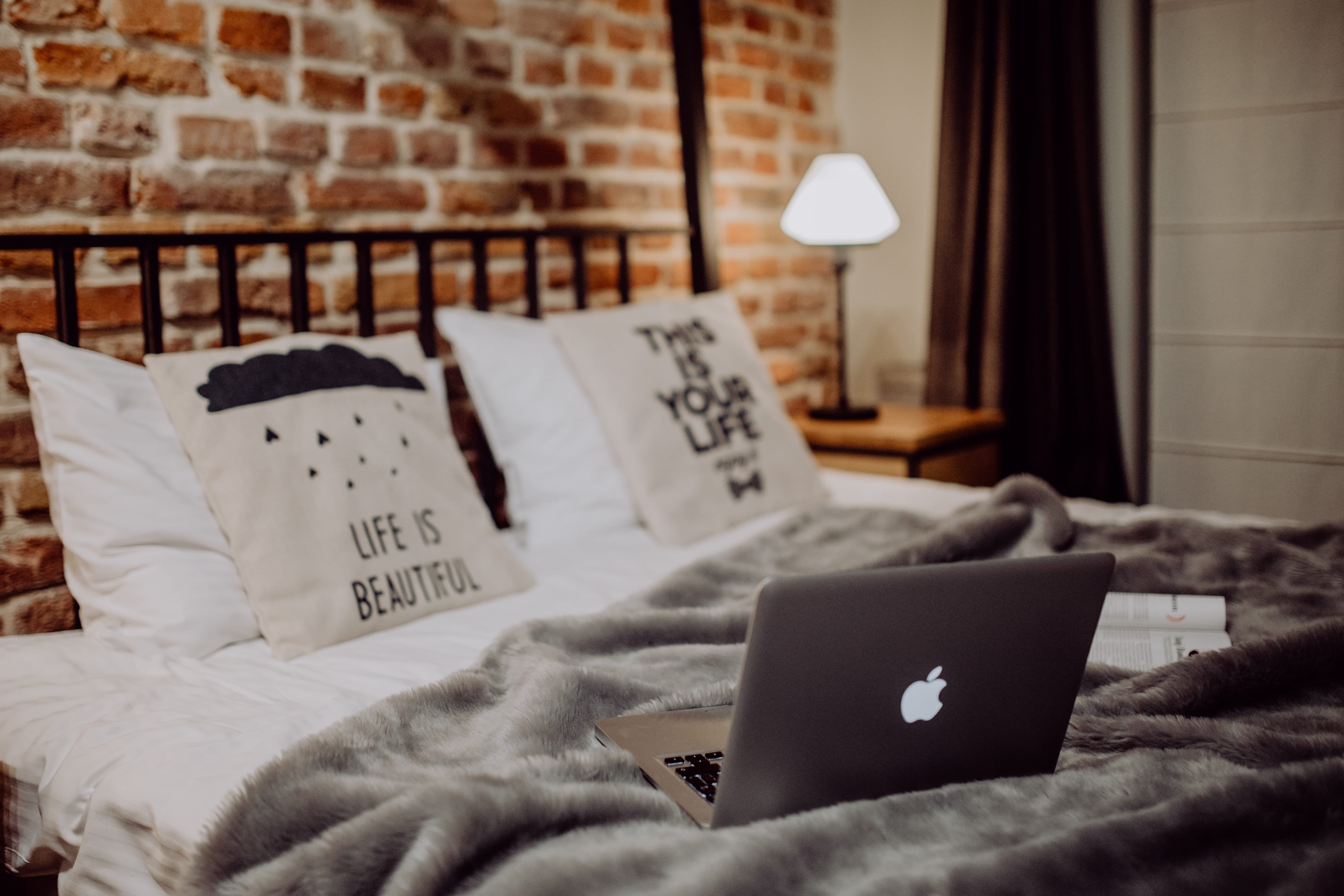 using laptop, evening, bed, laptop, brick wall, furniture, pillows, 4K, sheet, computer, enjoying, lighting equipment, bedroom, electric lamp, bedding, HD Wallpaper