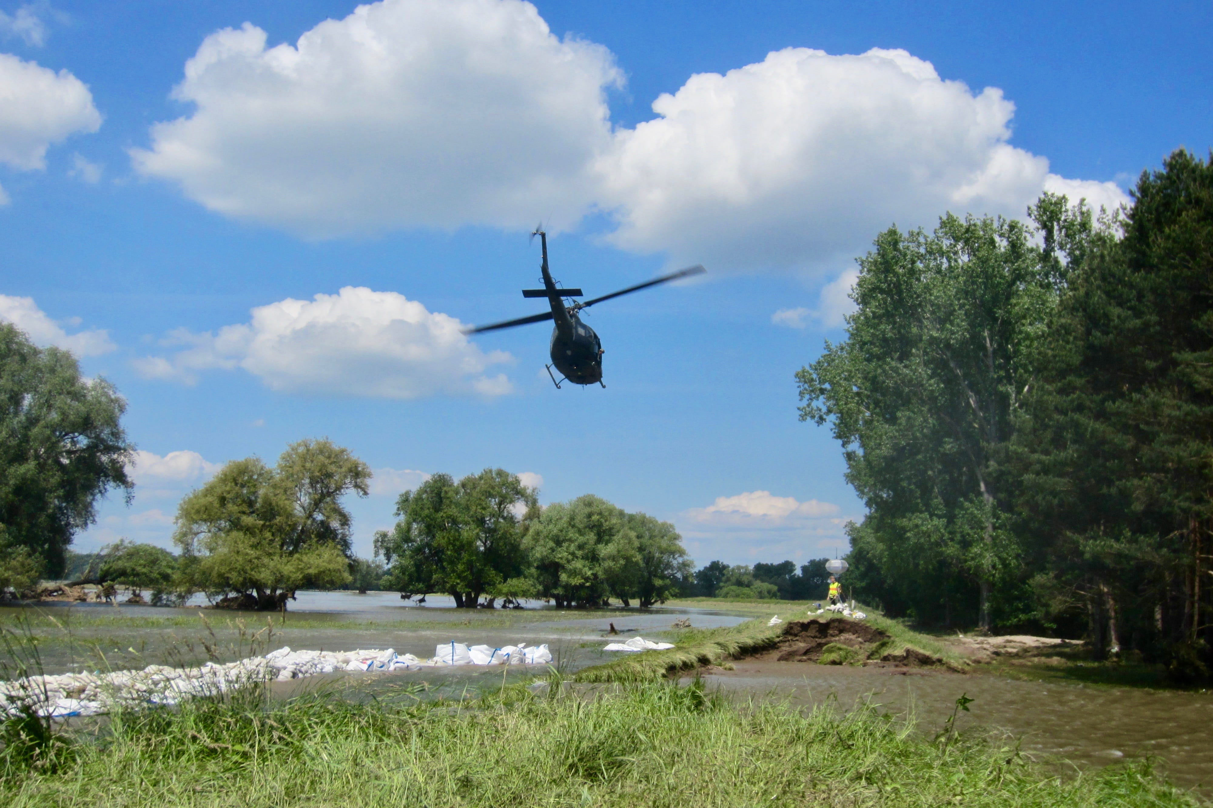 no people, mode of transportation, technical aid organization, ueberschwaemmung, Trough, air vehicle, grass, sand bag, mid-air, civil protection, motion, HD Wallpaper
