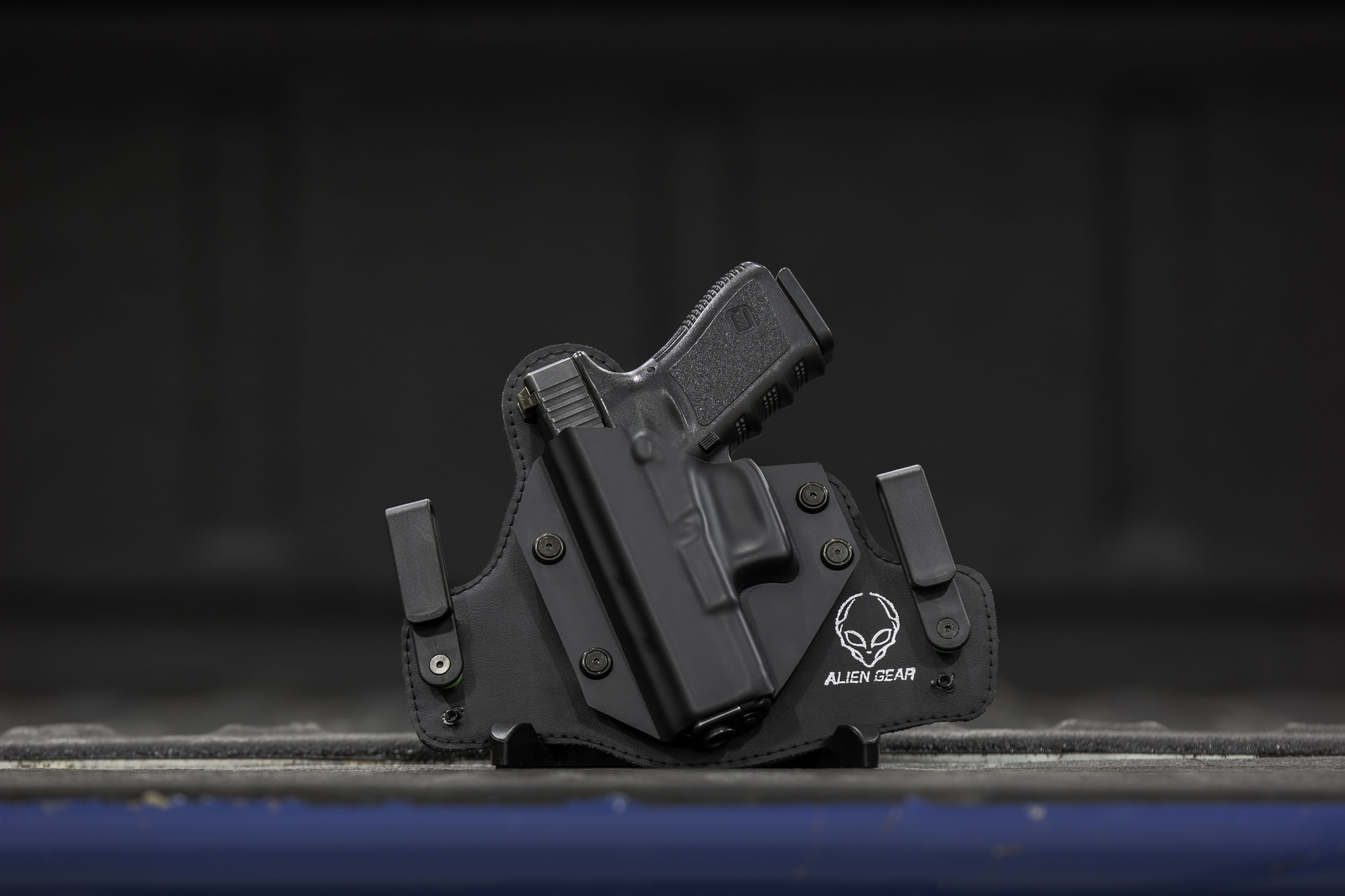 black background, Holster, still life, ccw, gun, technology, metal, pistol holster, owb holster, firearm, selective focus, gunrights, no people, focus on foreground, HD Wallpaper