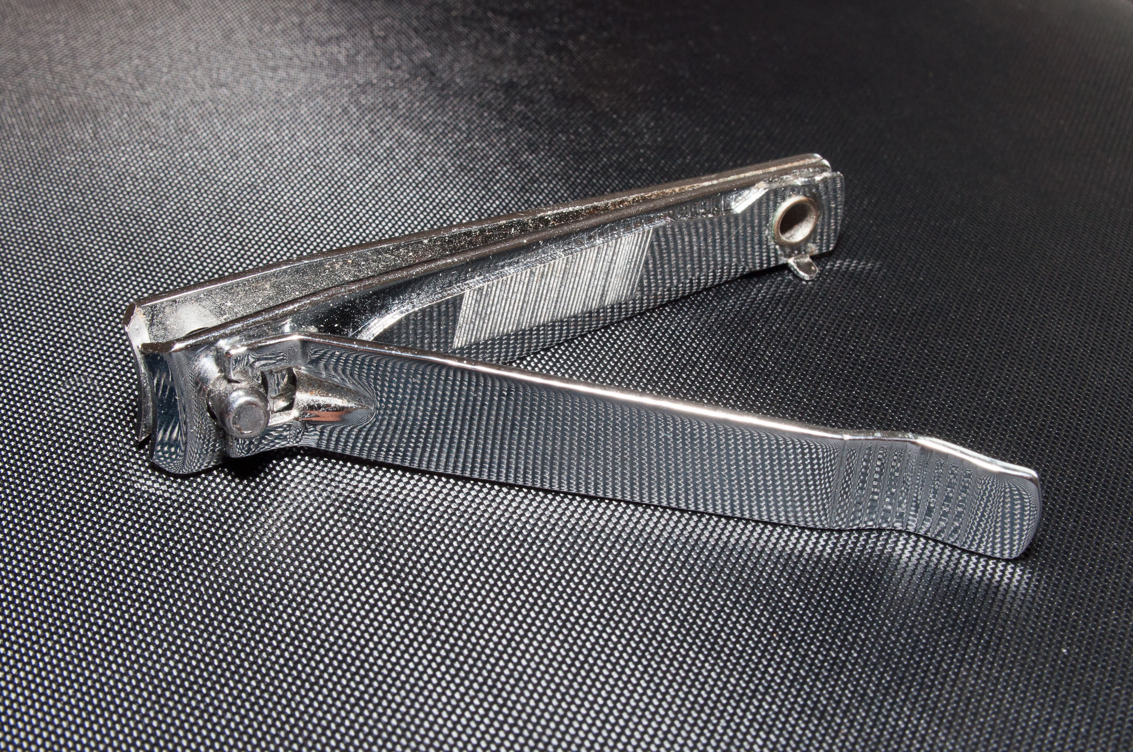 chrome, manicure, hand tool, nail clippers, metal, no people, nail clipper, table, full frame, silver colored, textile, 4K, close-up, zipper, tool, safety, HD Wallpaper