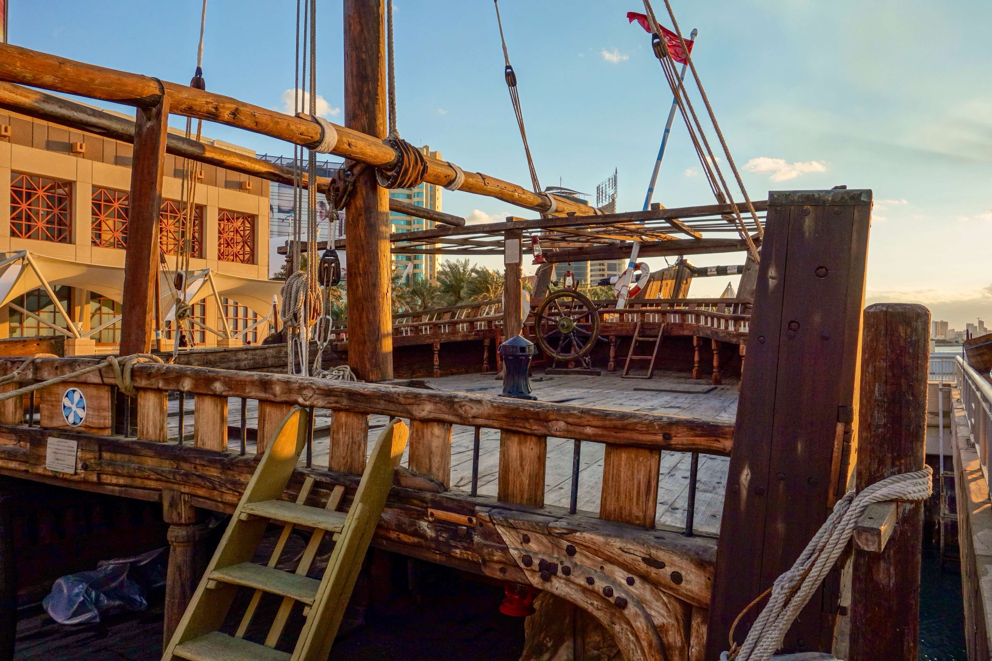 sunray, steering, wooden, cargo ship, ship, wood - material, boat deck, rope, machinery, day, built structure, industry, sunrise, blue, kuwait, sailboat, HD Wallpaper