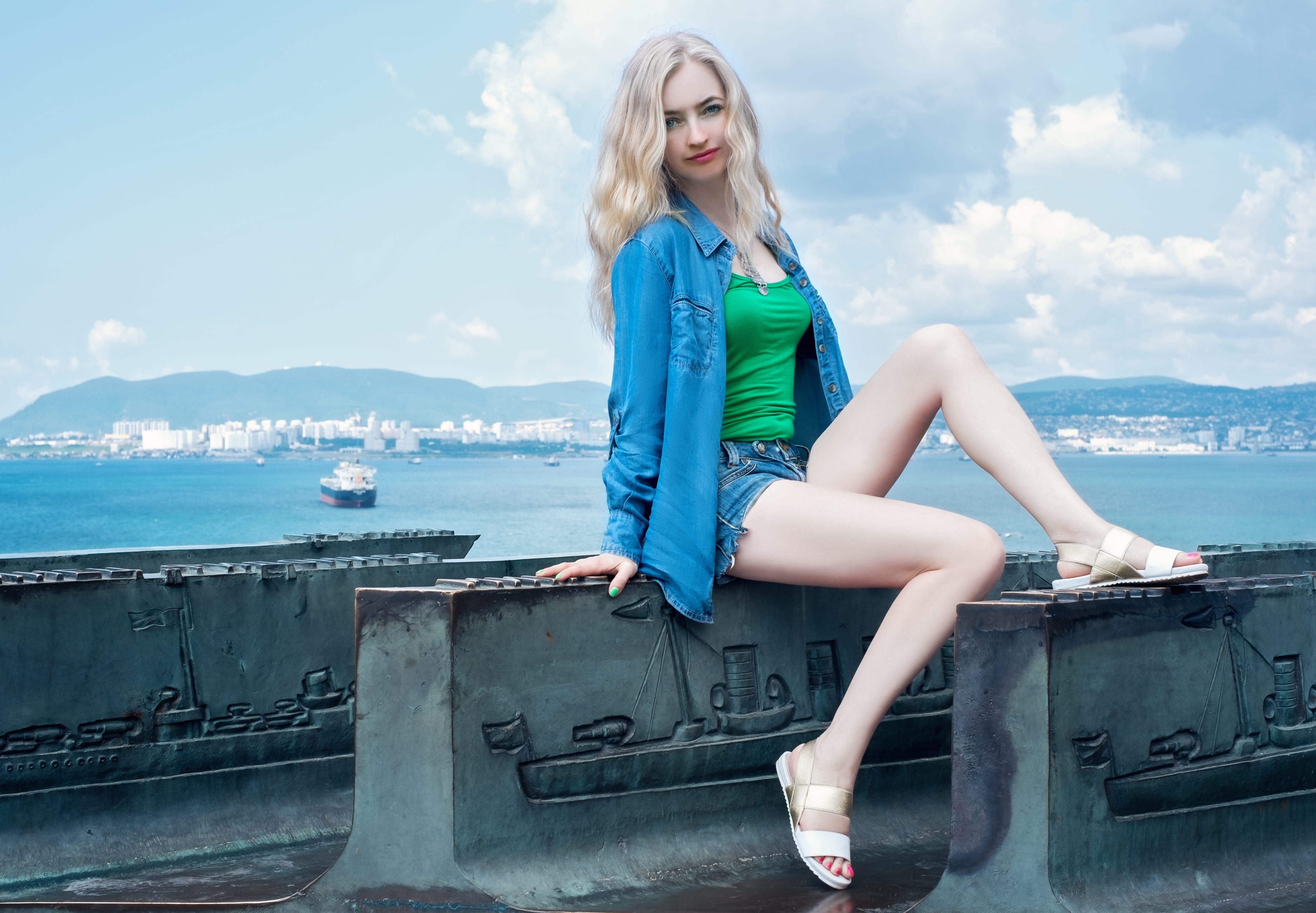 woman in blue, model, stone, sitting, one young woman only, hairstyle, woman, shirt, one woman only, clouds, real people, concrete, blue denim, sport, hair, HD Wallpaper